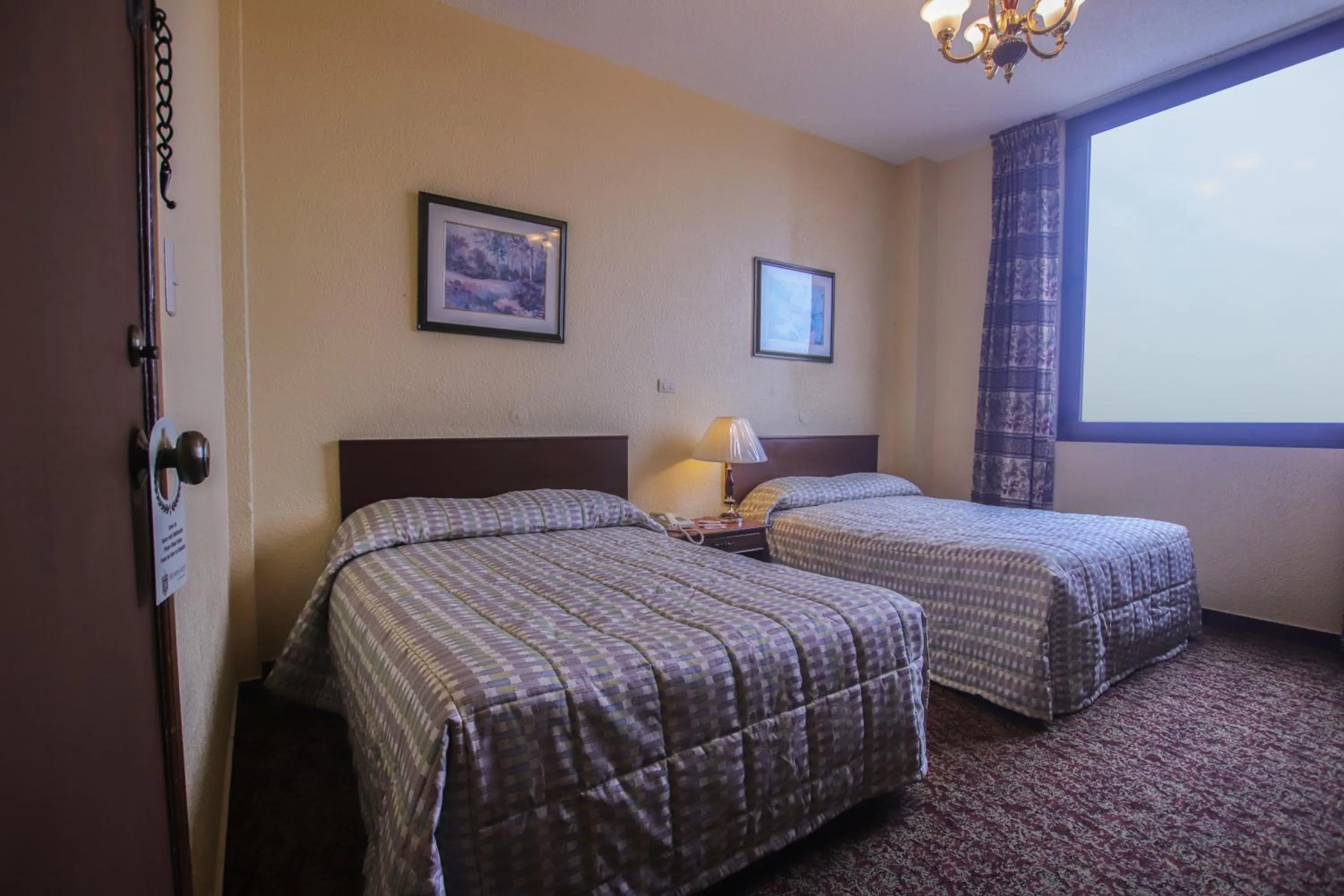 Bed in Hotel Montecarlo