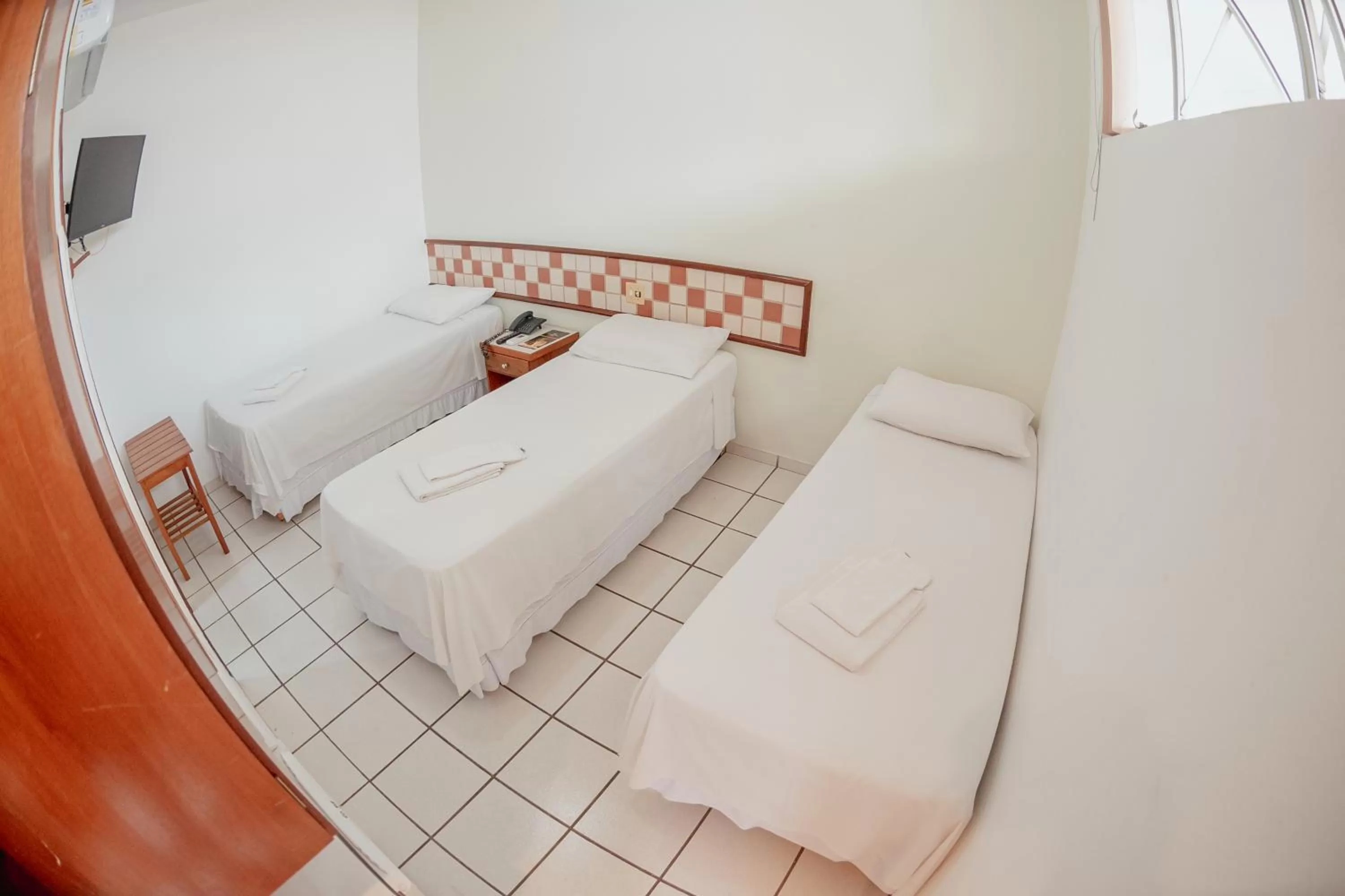 Bed in Hotel Metropolitano