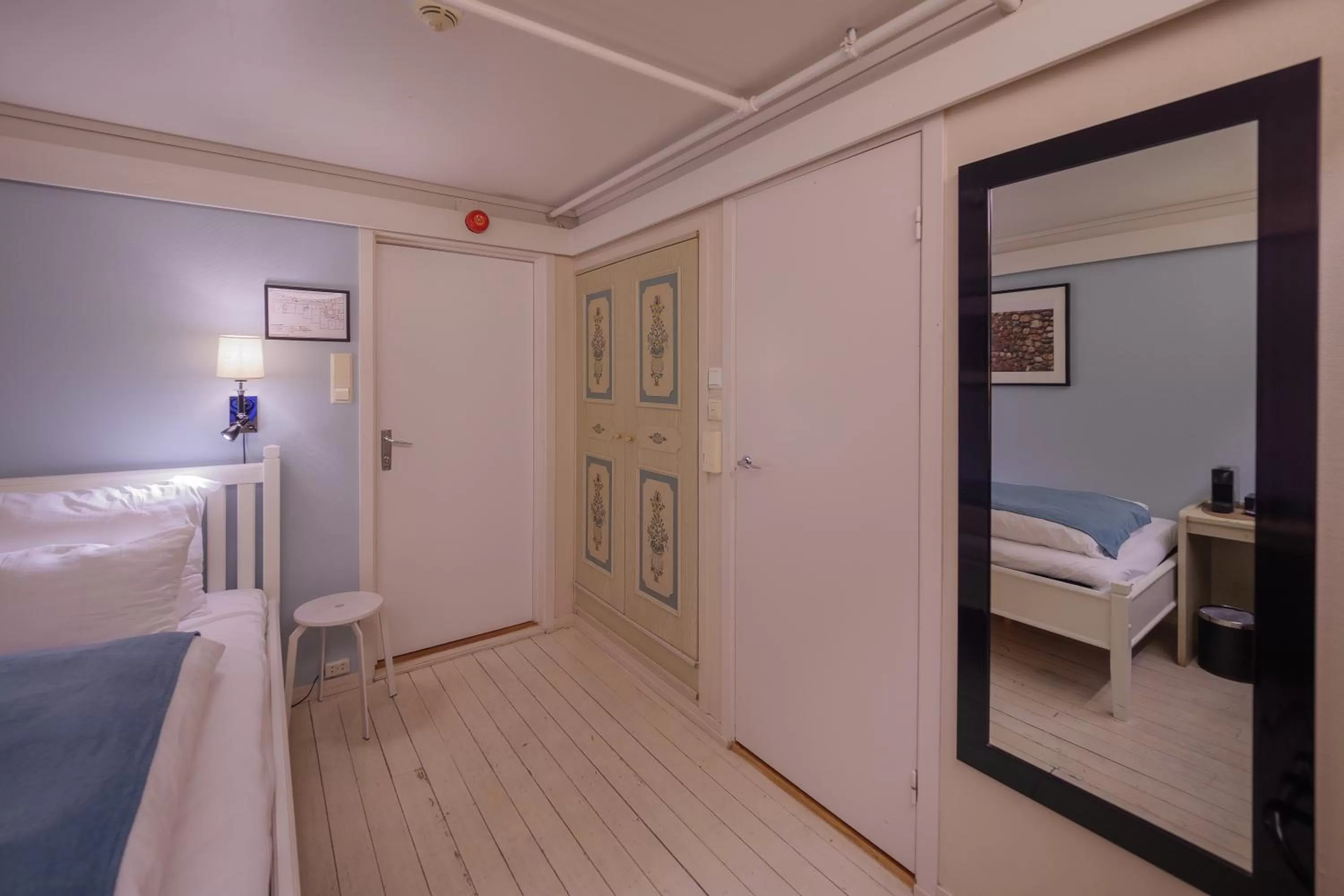 Photo of the whole room, Bed in Strand Hotel Fevik - by Classic Norway Hotels