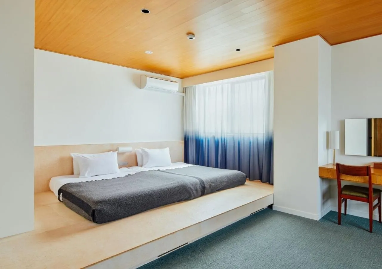 Bed in Hotel Graphy Nezu