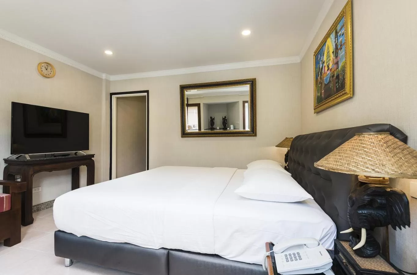 Photo of the whole room, Bed in The Ambiance Hotel