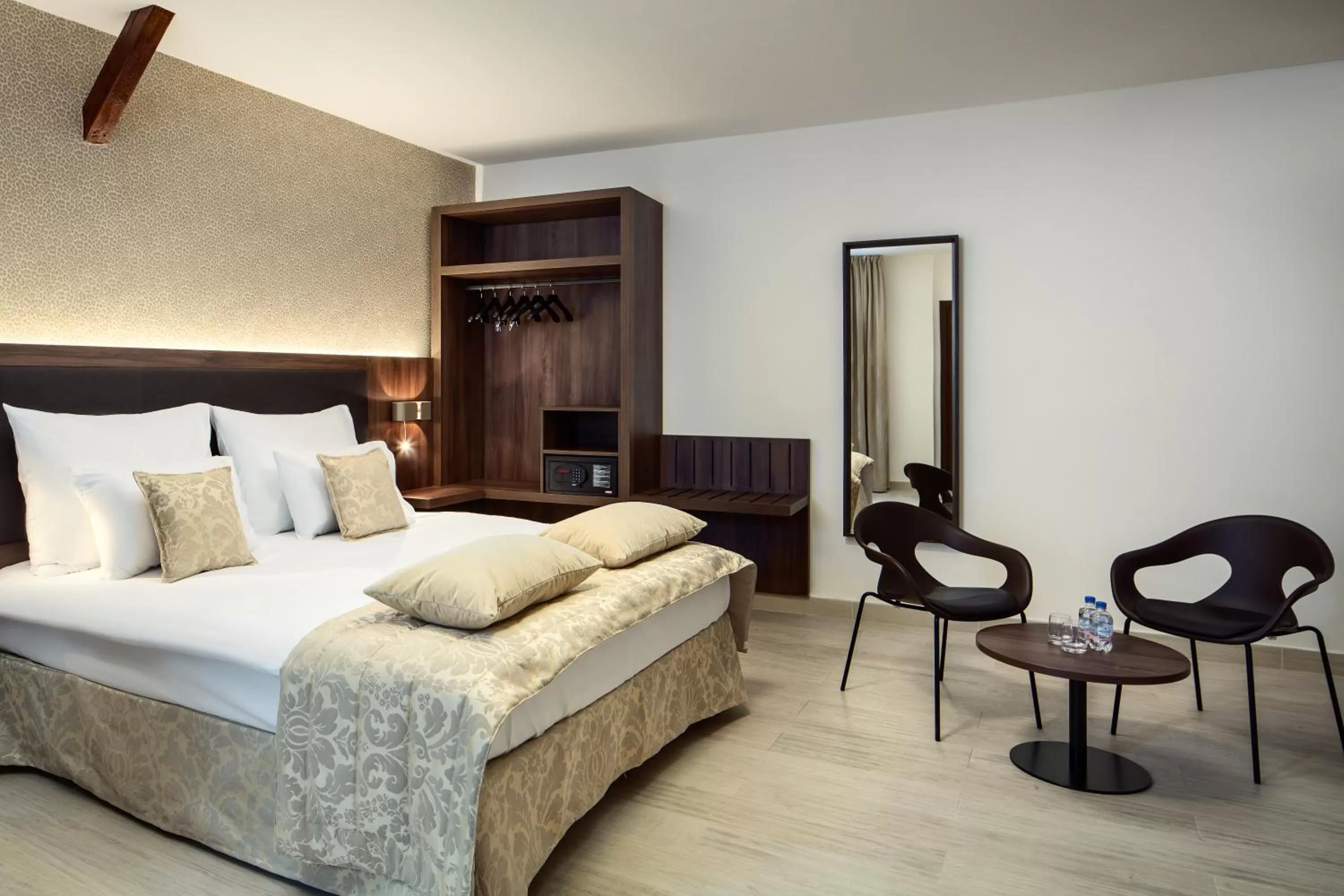 Bed in Michelangelo Grand Hotel