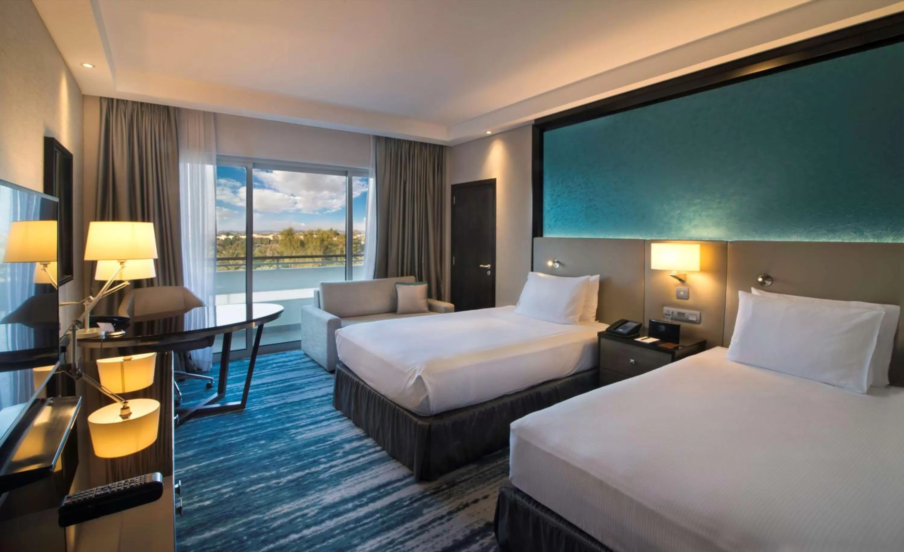 Living room, Bed in Radisson Blu Hotel & Resort, Al Ain