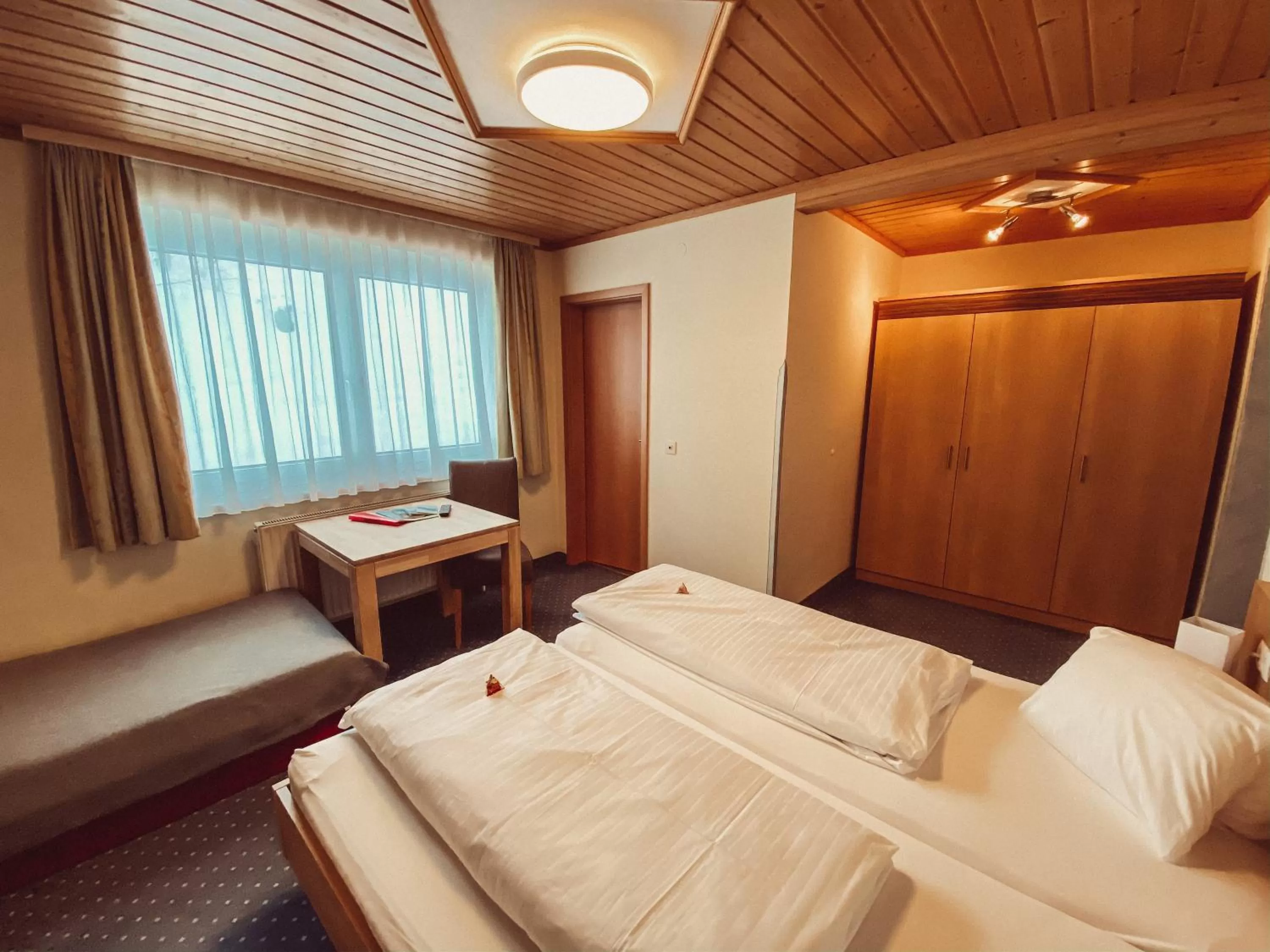 Bed in Frühstückspension Auer - Haus Kargl