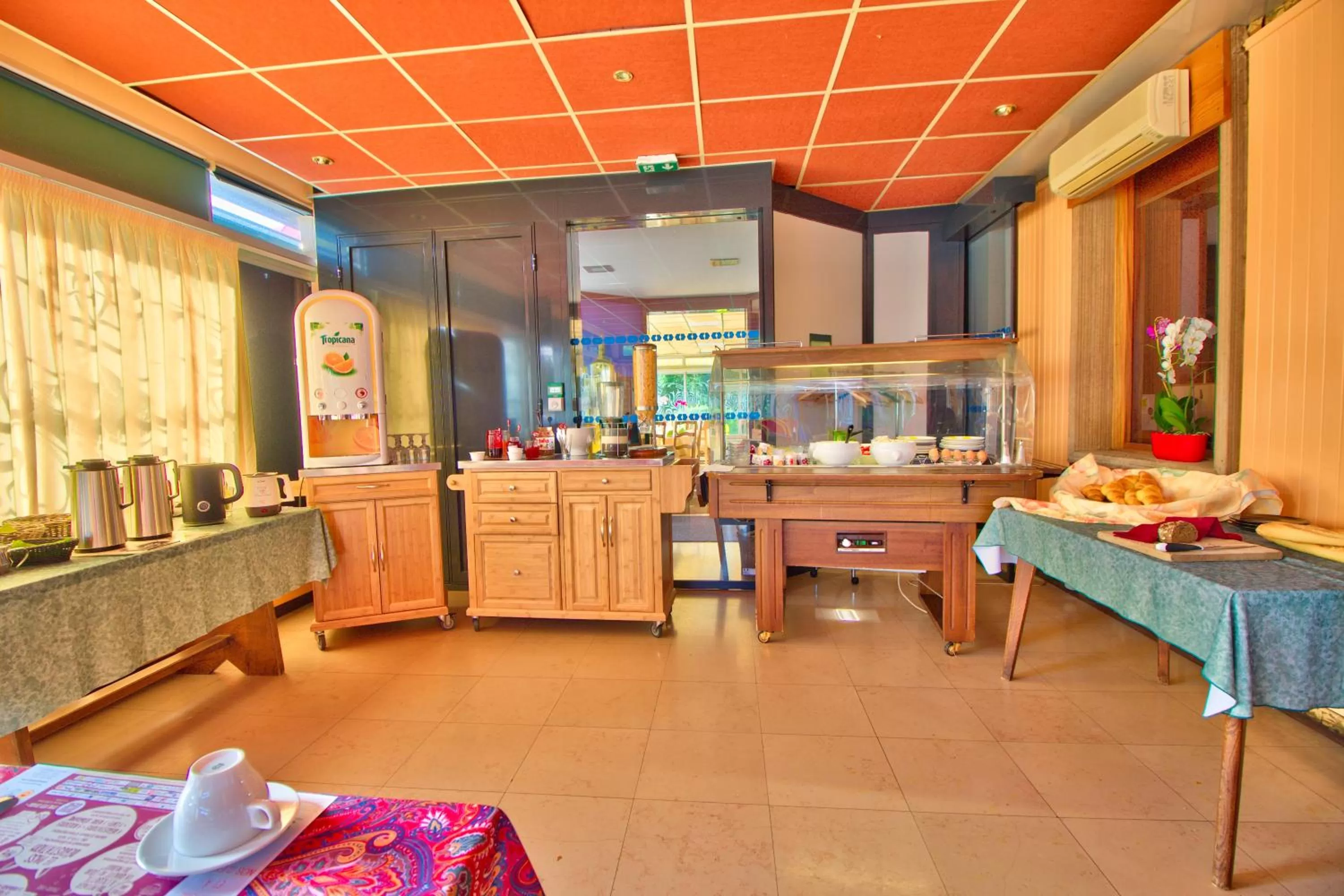 Buffet breakfast in Logis Hôtel Restaurant Le Chalet du Mont Roland