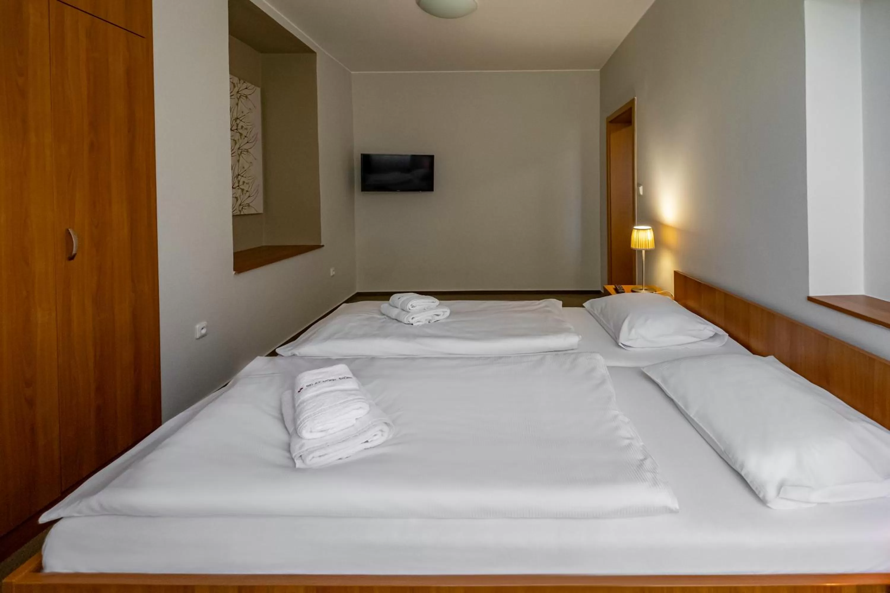 Bed in Relax Hotel Stork