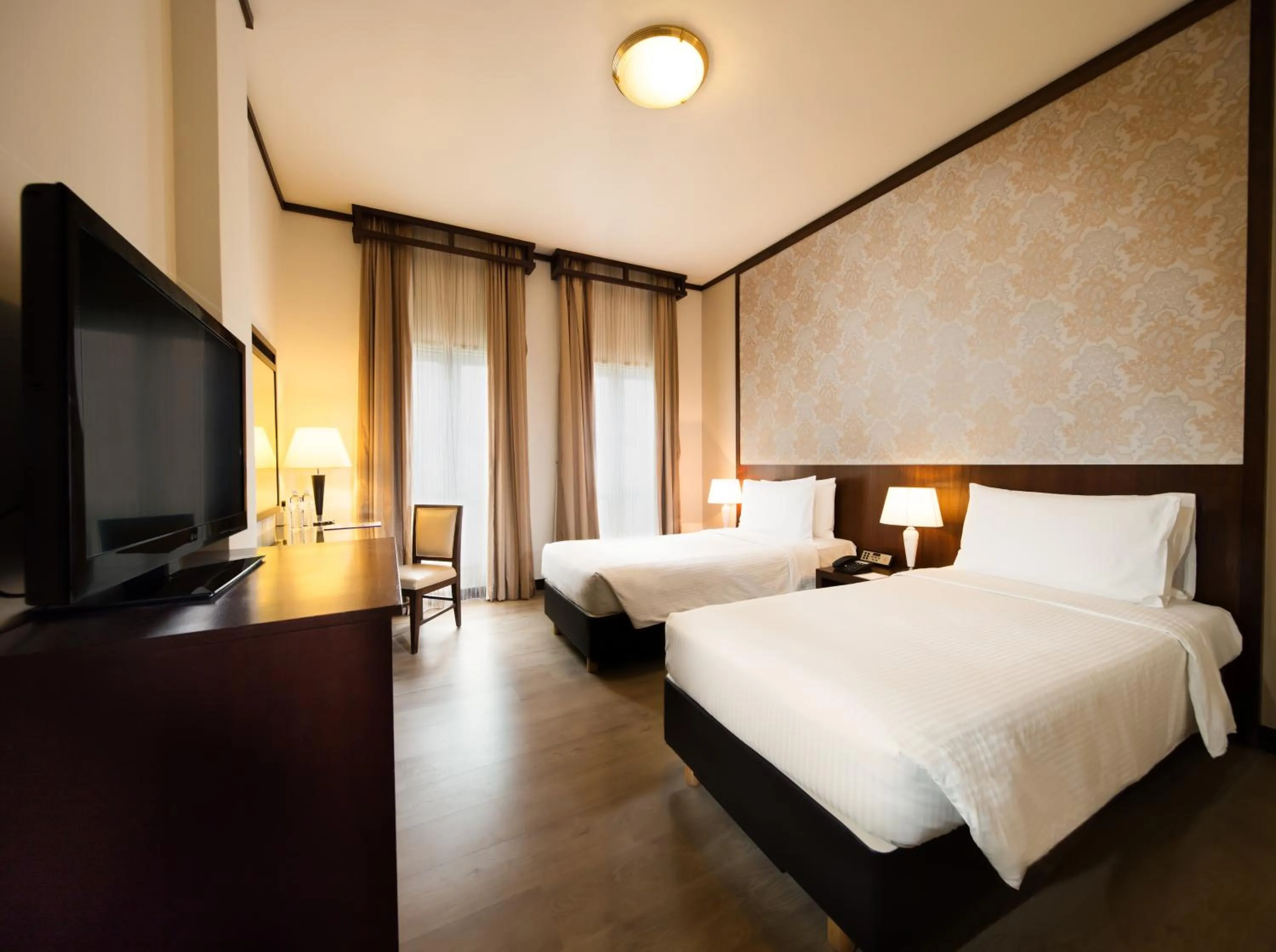 Bed in Village Hotel Albert Court by Far East Hospitality