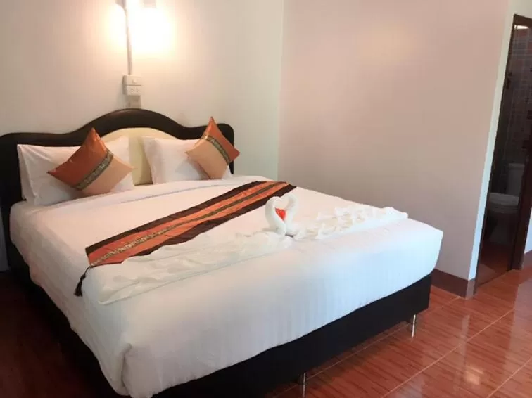 Bed in Hugpua Hotel