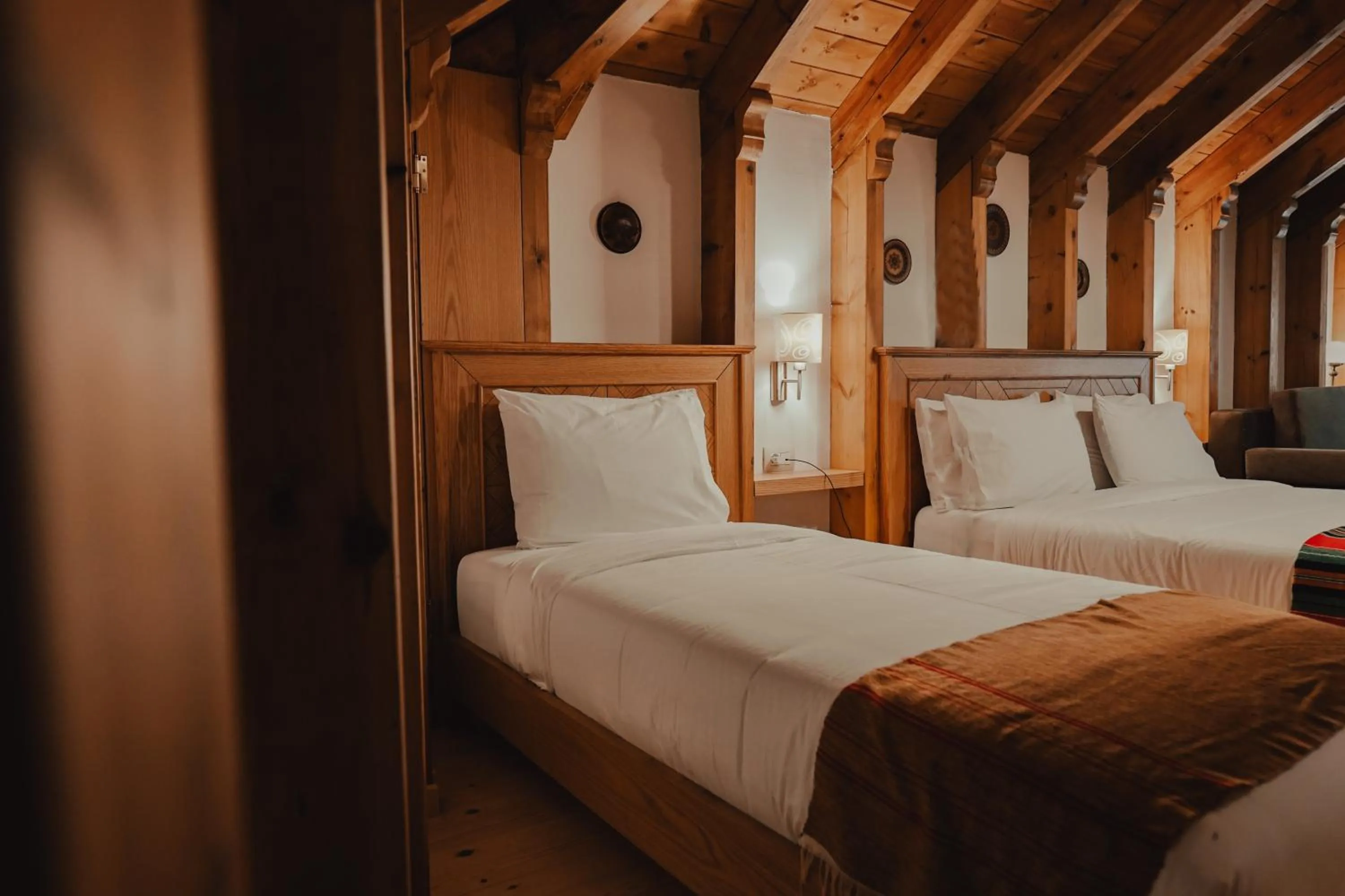 Bed in Hotel Argjiro