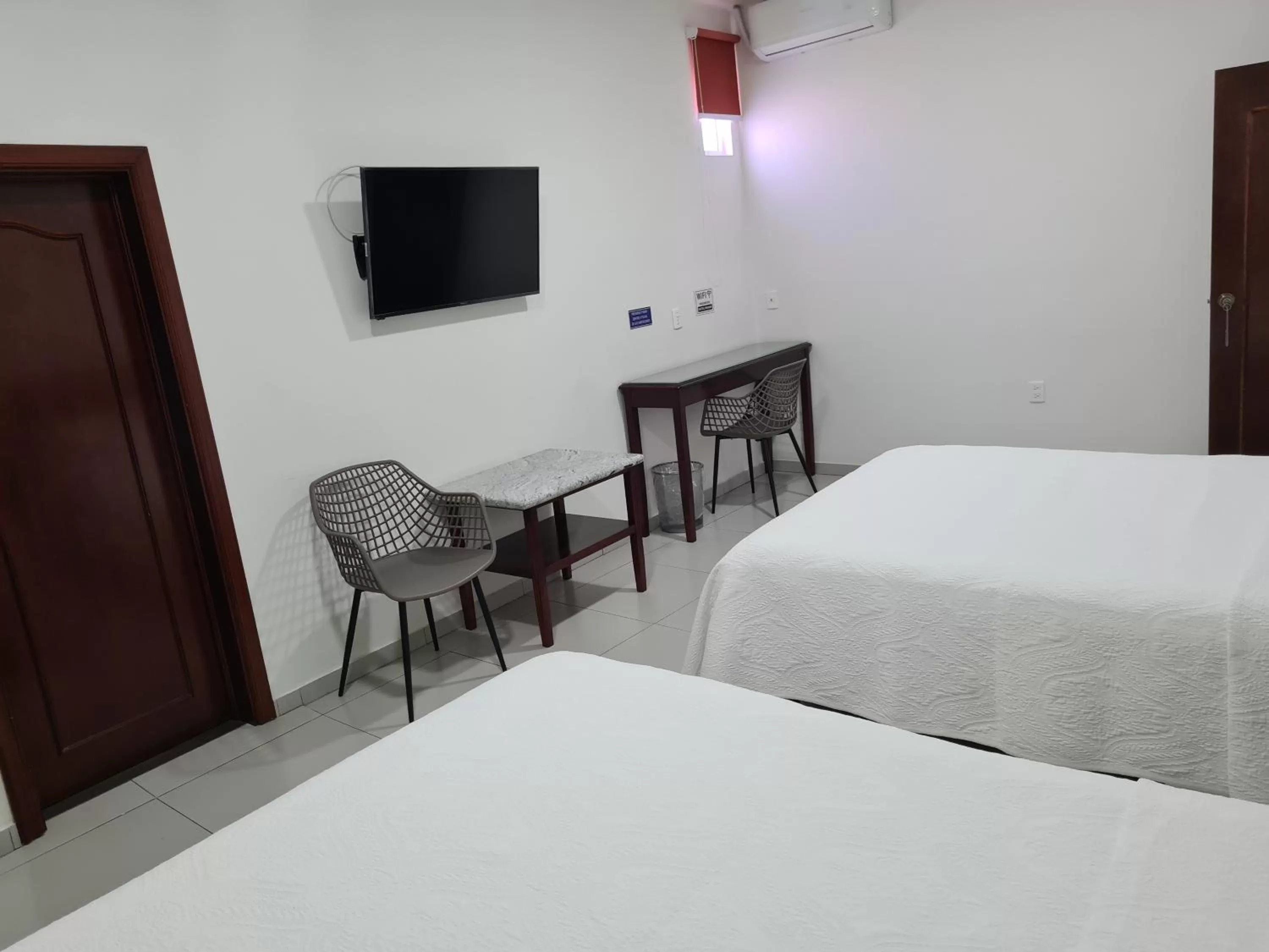 Bed in HOTEL FINA INN