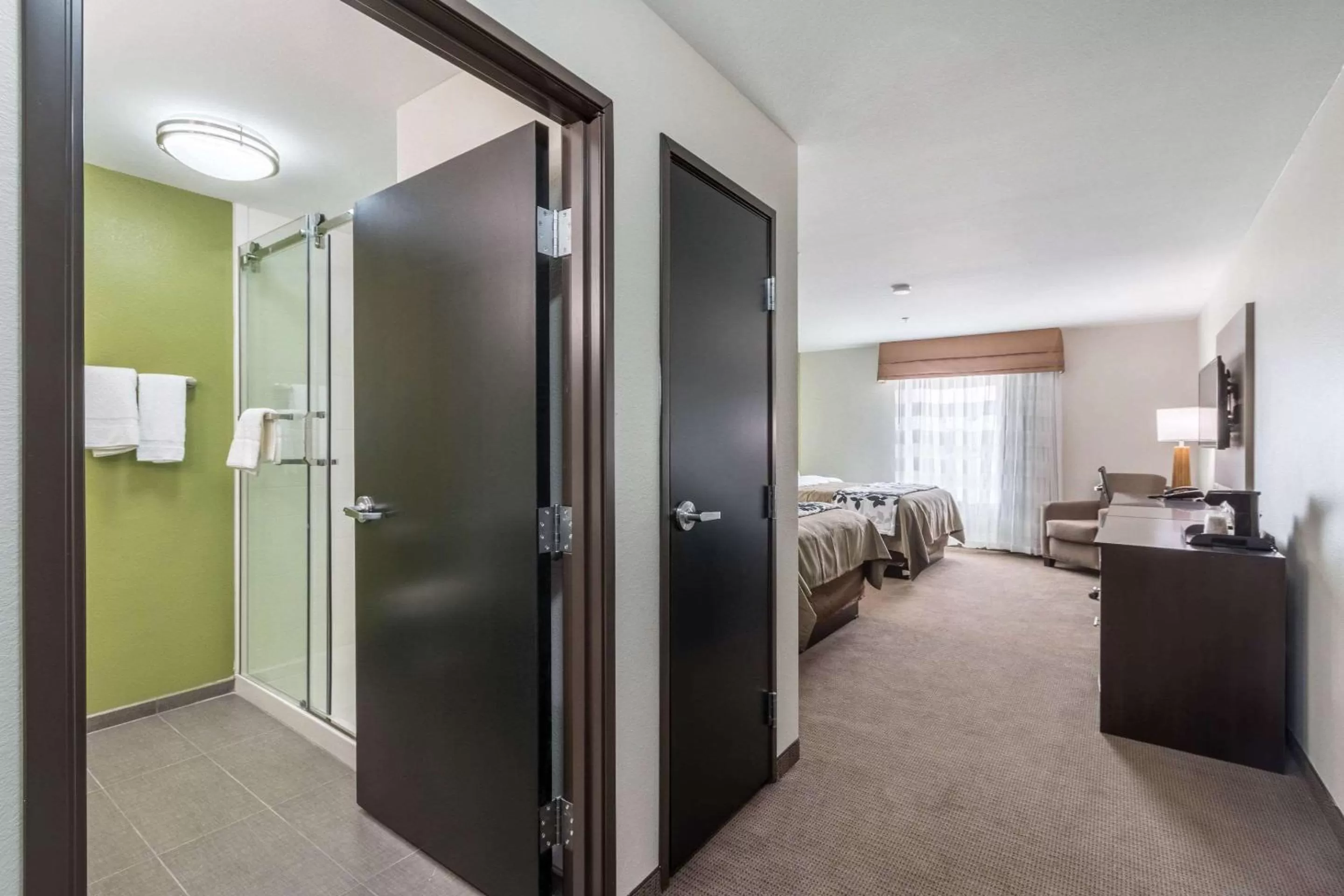 Photo of the whole room, Bed in Sleep Inn & Suites College Station near University