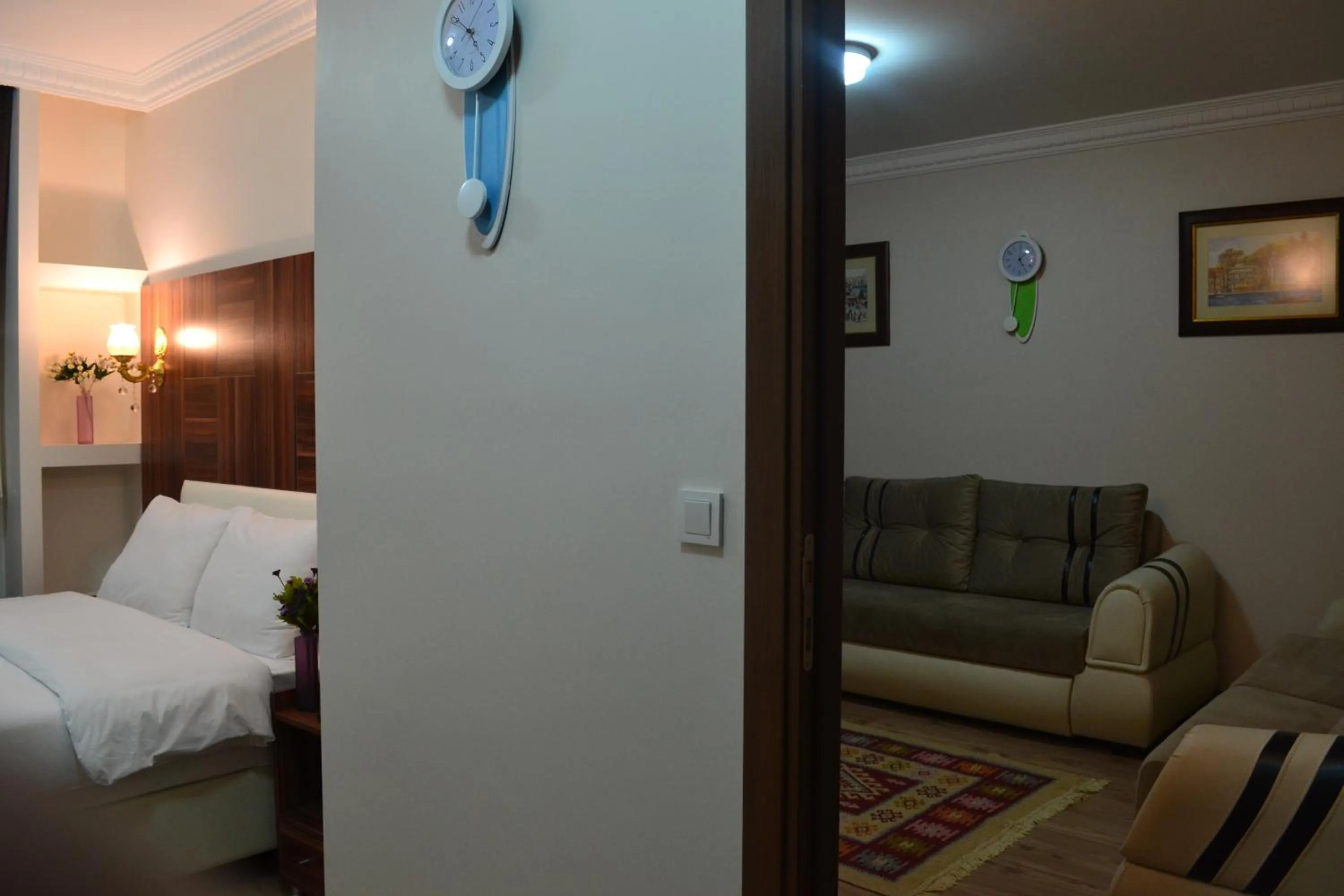 Living room, Bed in New Fatih Hotel