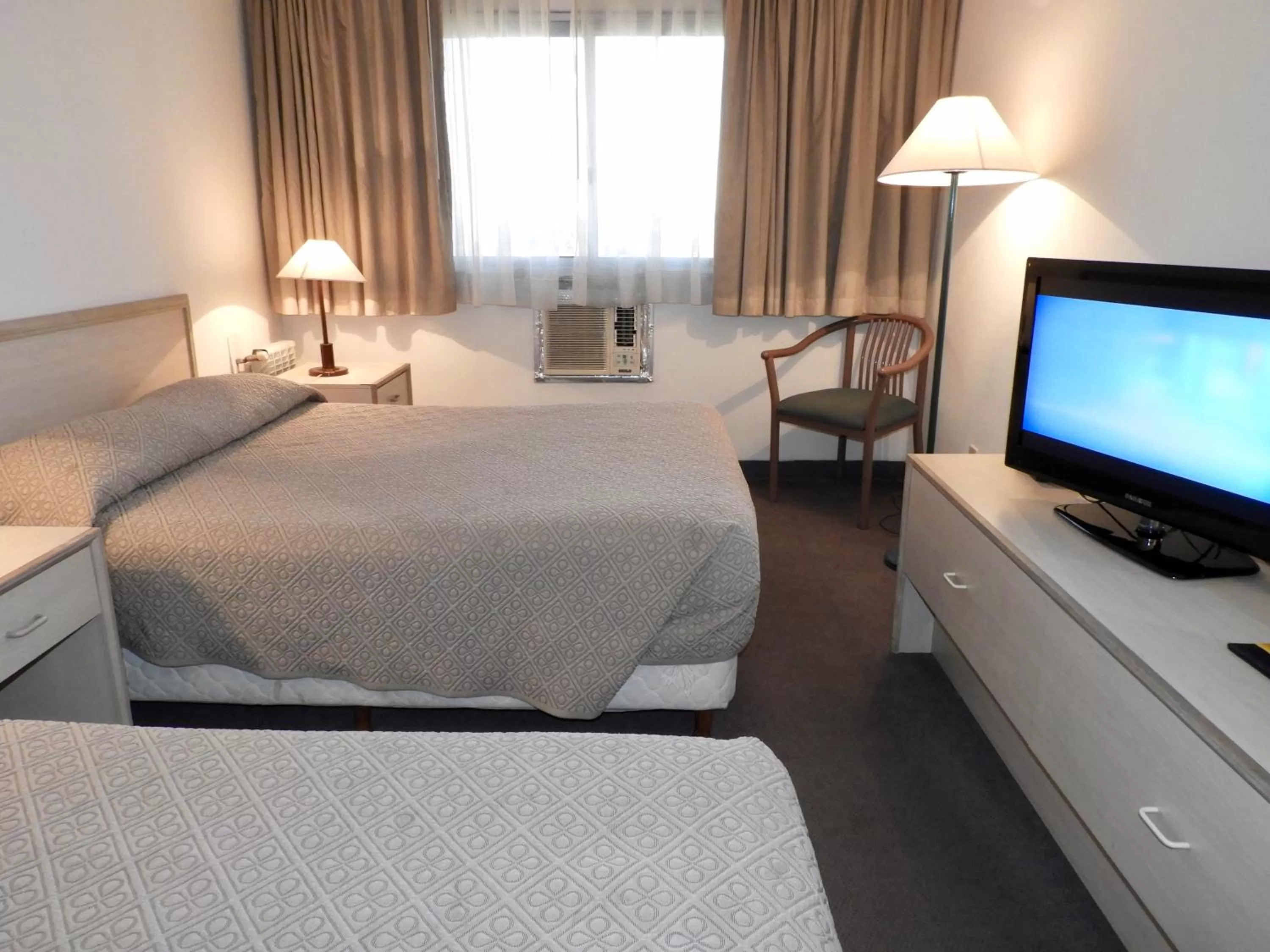 Photo of the whole room, Bed in Hotel Tres Cruces