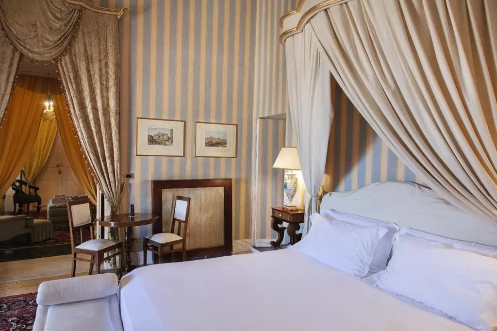 Bed in Palazzo Cherubini-Pools & Wellness