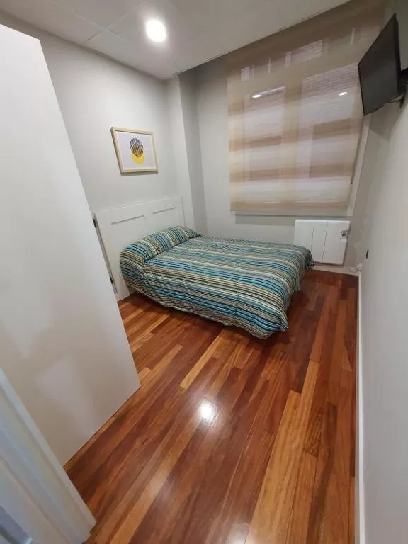 Bed in Guggenheim Riverview 5 Bedrooms