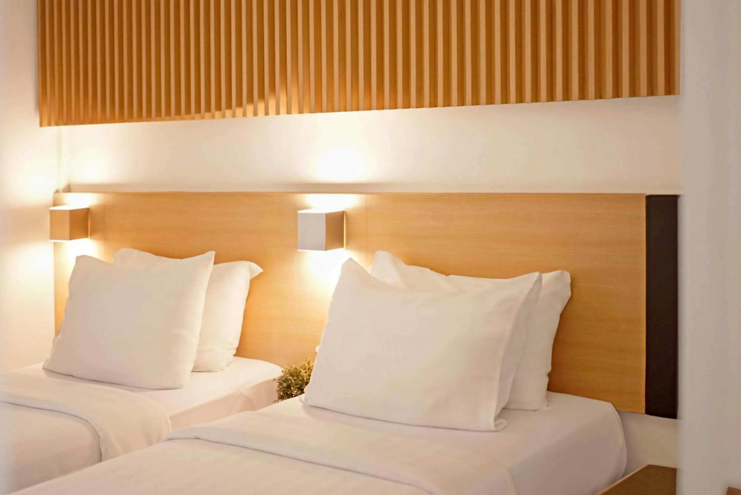 Bed in Malaka Hotel Bandung