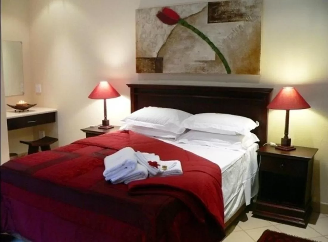 Photo of the whole room, Bed in Rustenburg Boutique Hotel