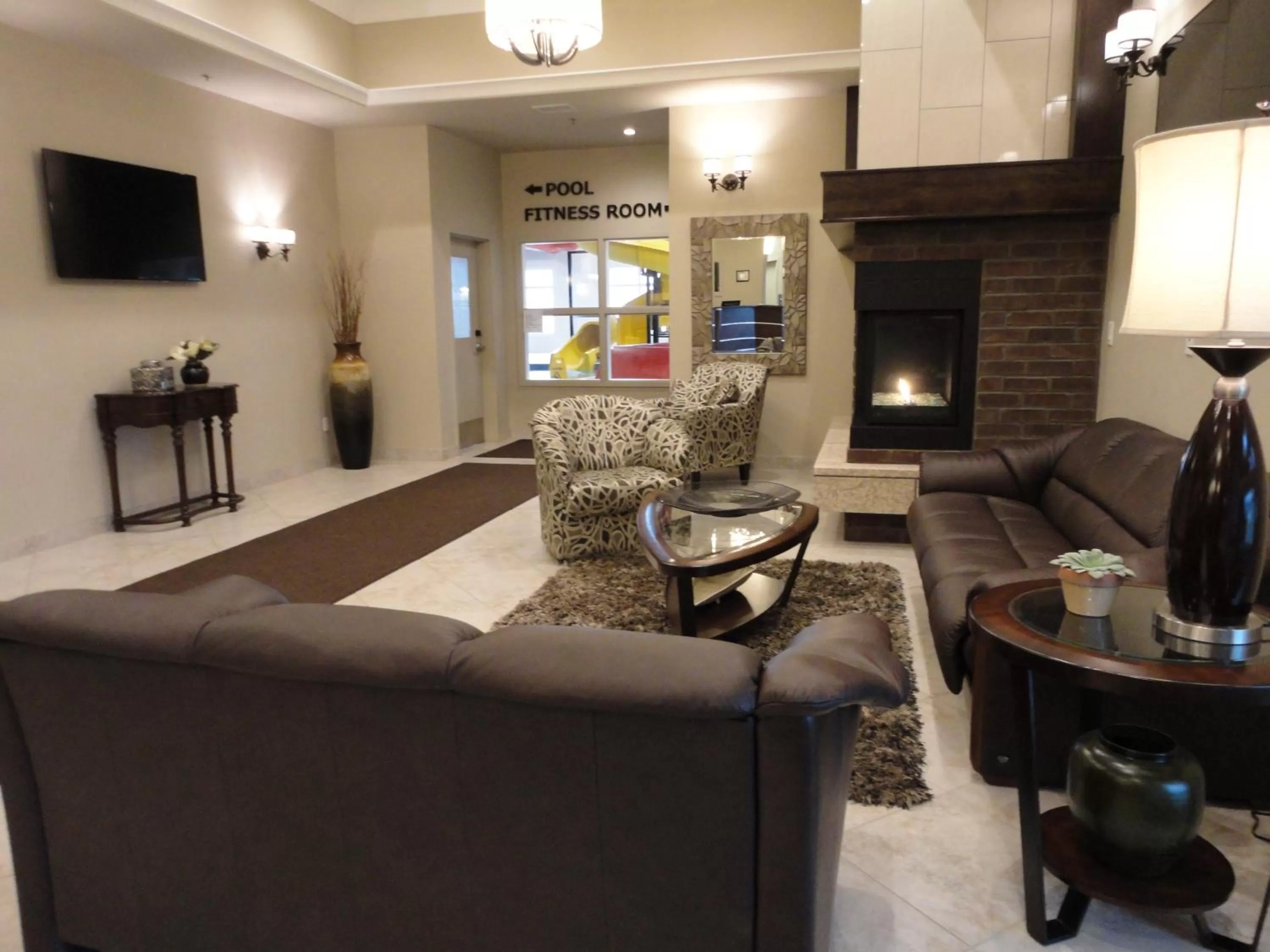 Lobby or reception in Ramada by Wyndham Emerald Park/Regina East