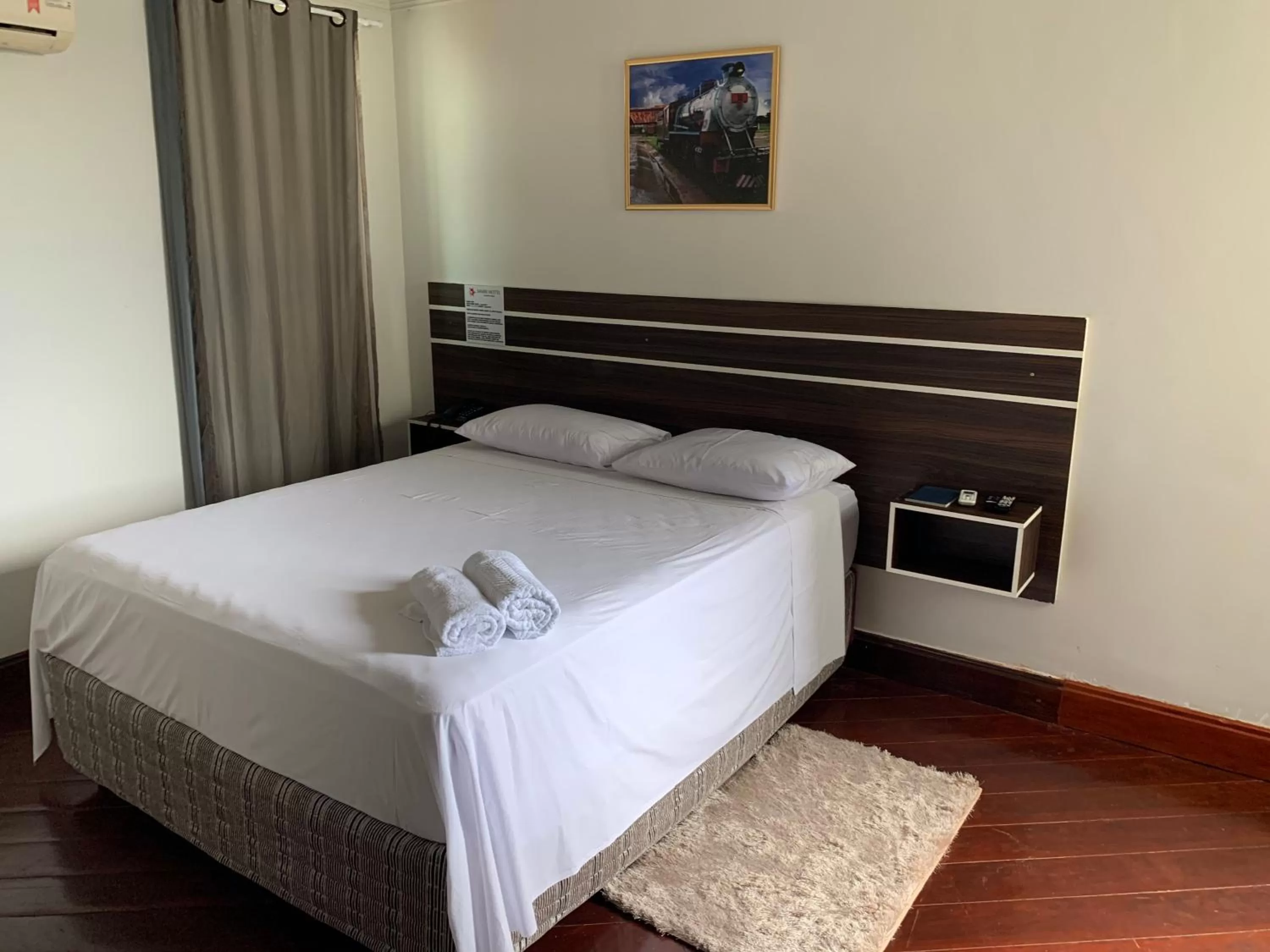 Bed in SAMIR HOTEL COMFORT