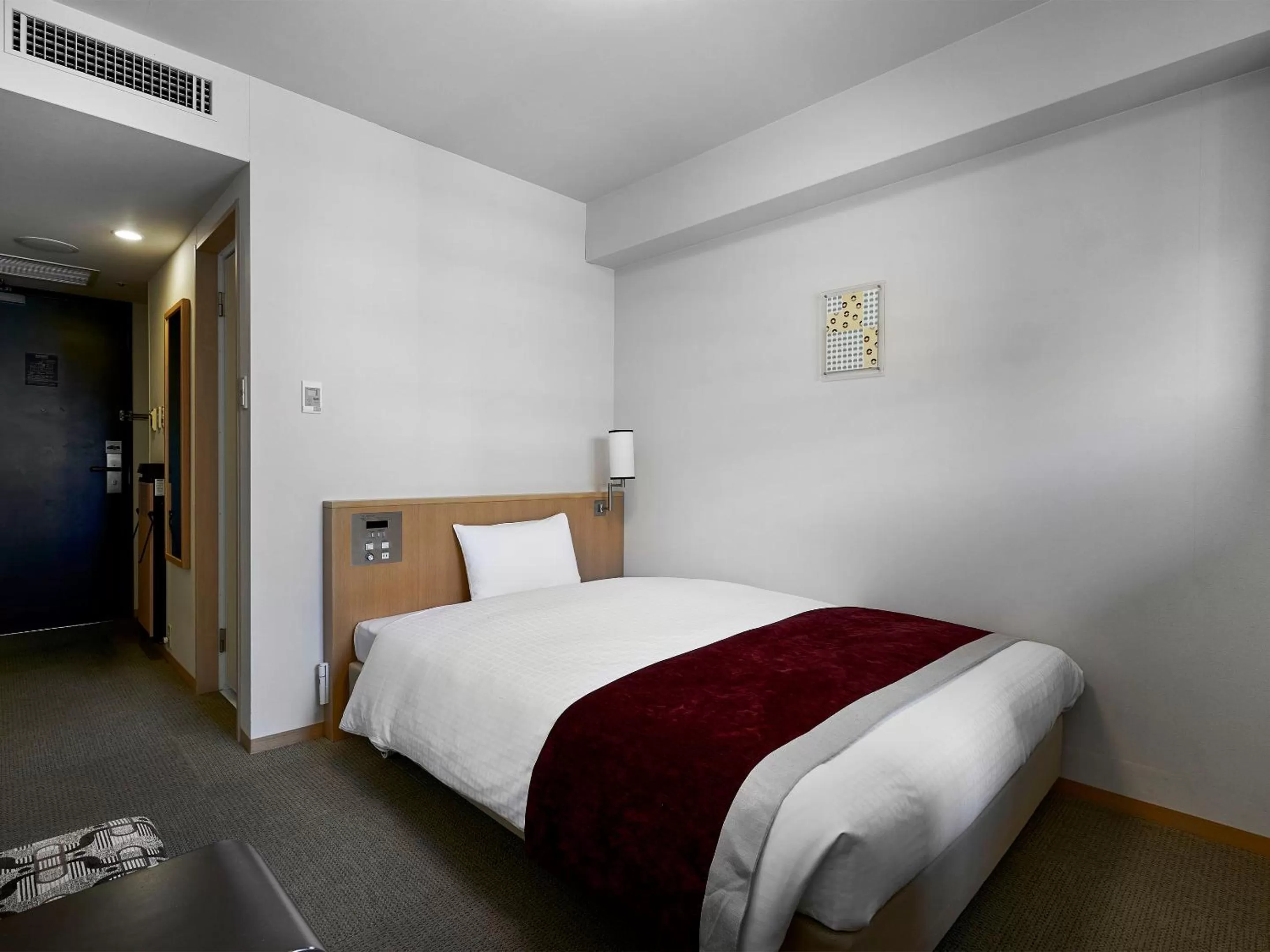 Photo of the whole room, Bed in Daiwa Roynet Hotel Hiroshima