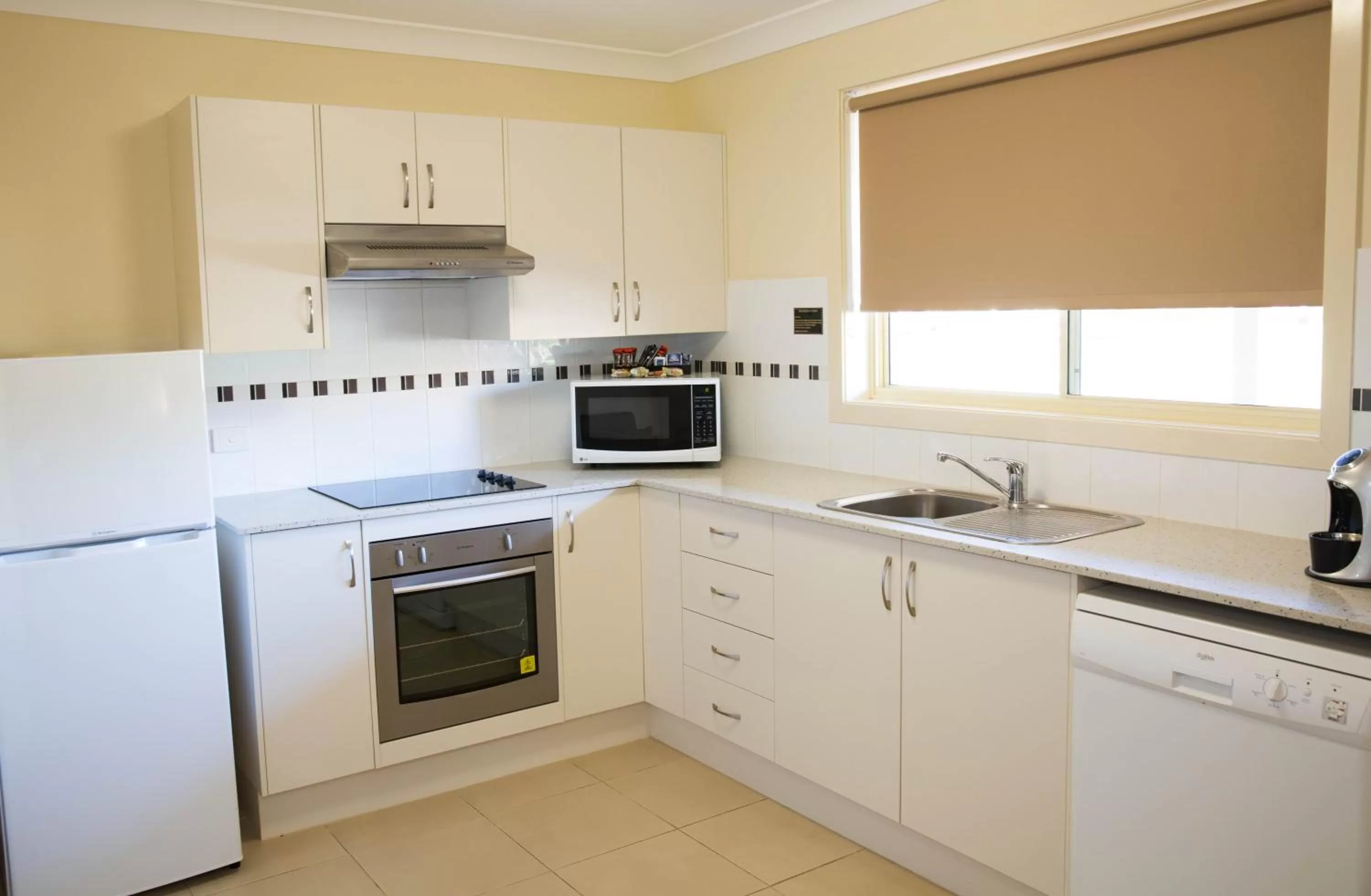 Kitchen or kitchenette in Scone Motor Inn & Apartments