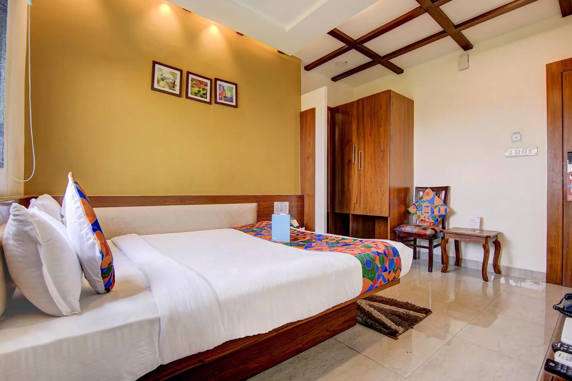 Bedroom in FabHotel The Khushi Regent