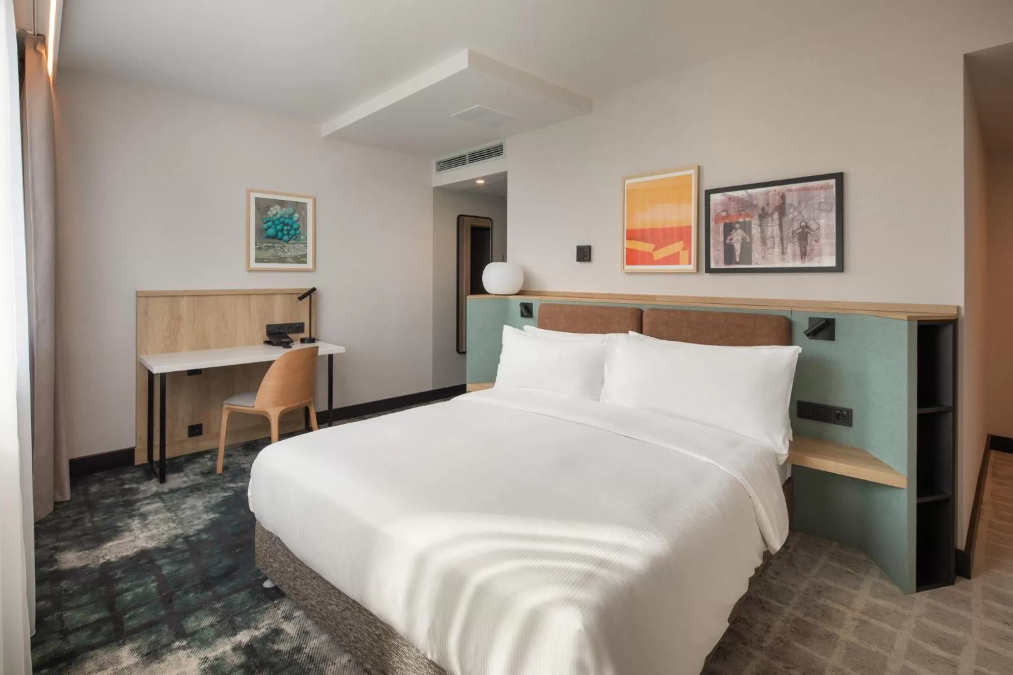 Photo of the whole room, Bed in Crowne Plaza Budapest by IHG