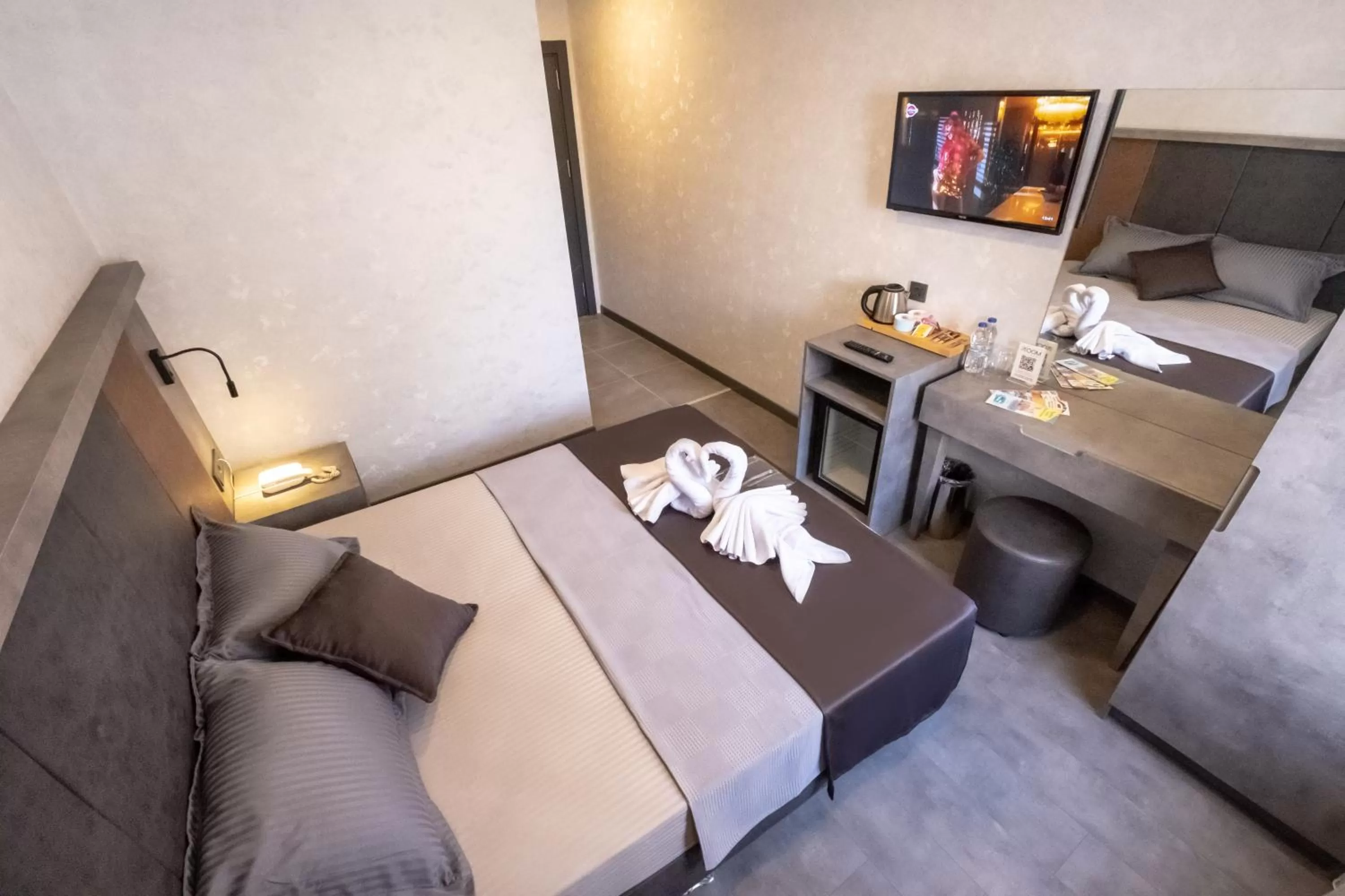 Bed in The Queen Hotel