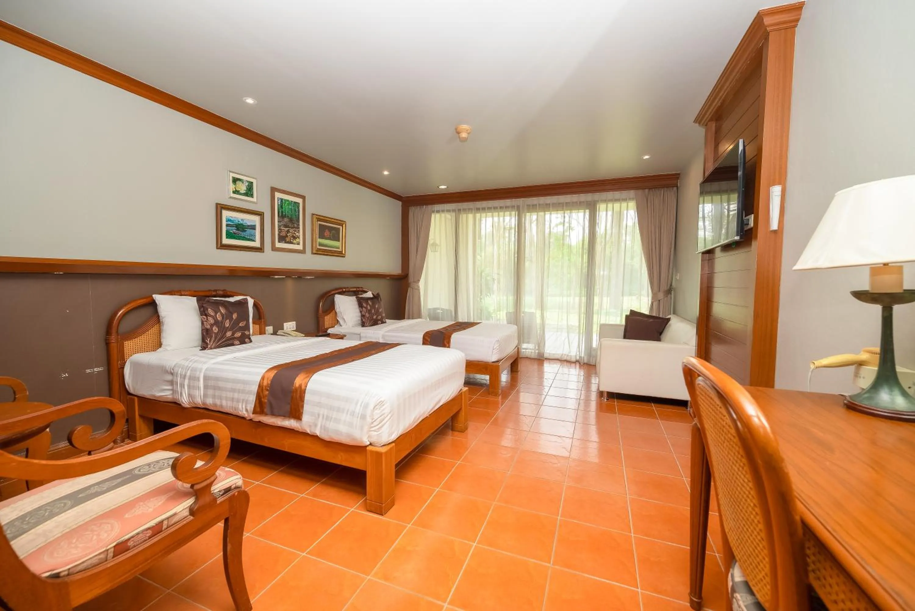 Bed in Comsaed River Kwai Resort