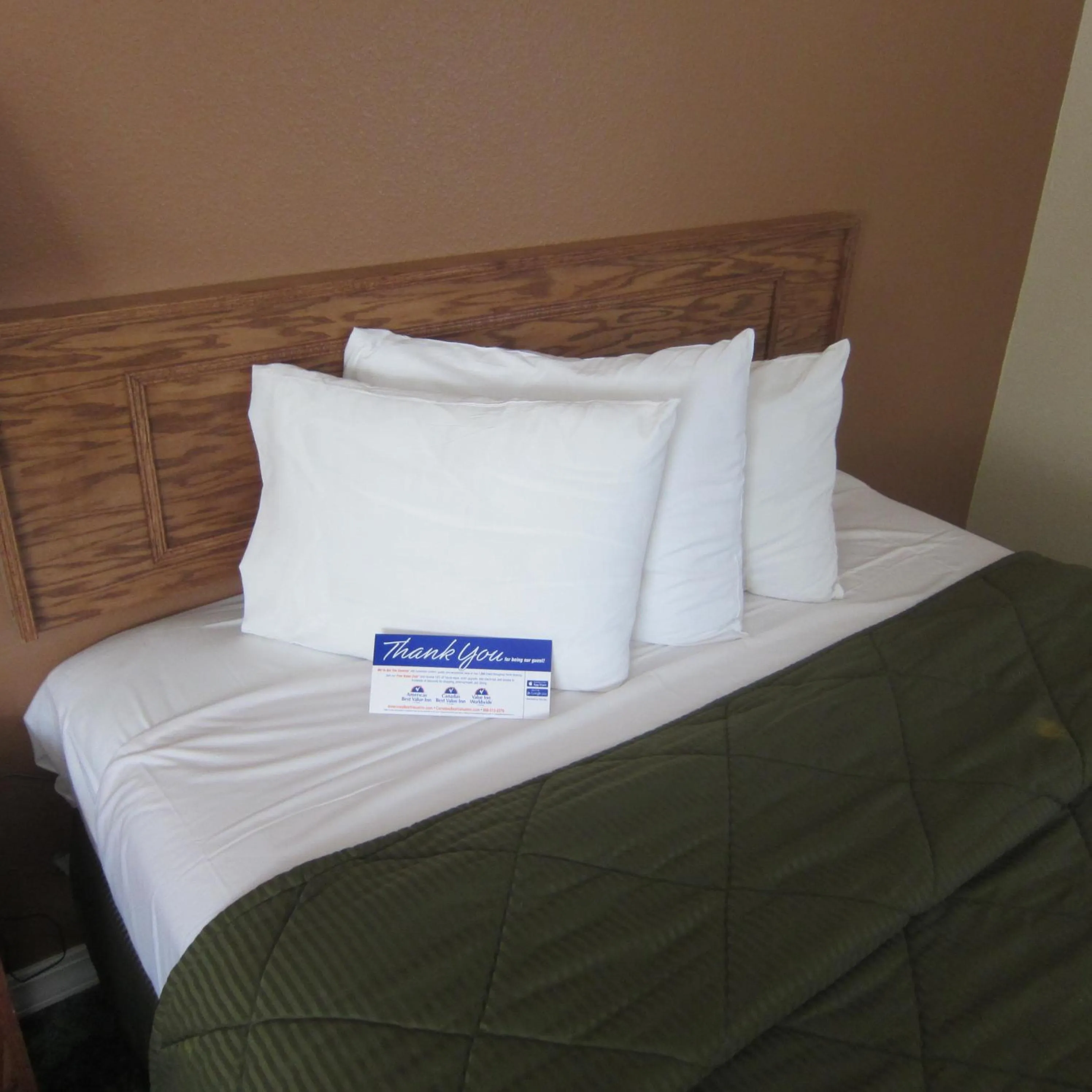 Bed in Pacific Best Inn