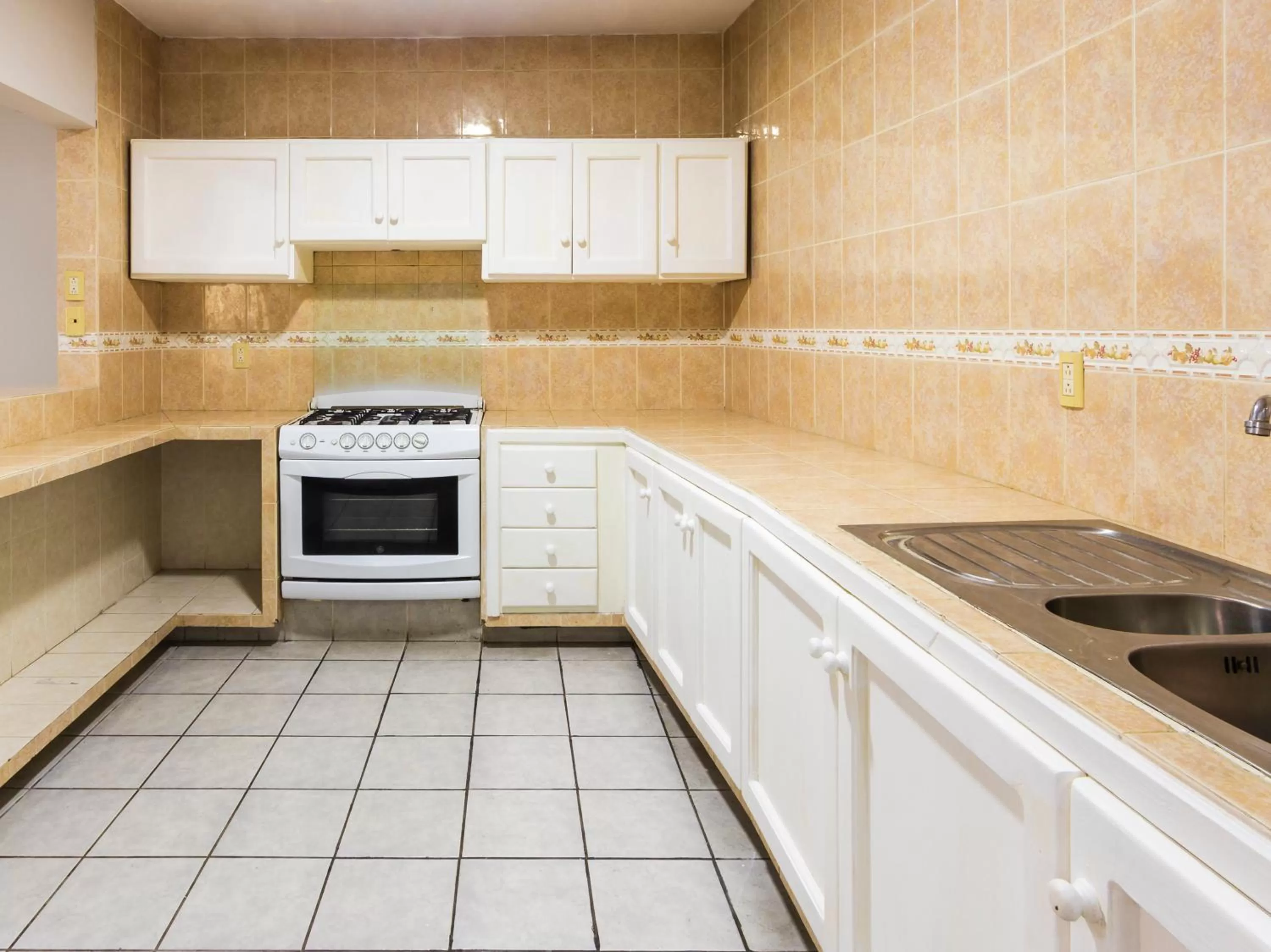 Kitchen or kitchenette in Boca Inn Hotel & Suites