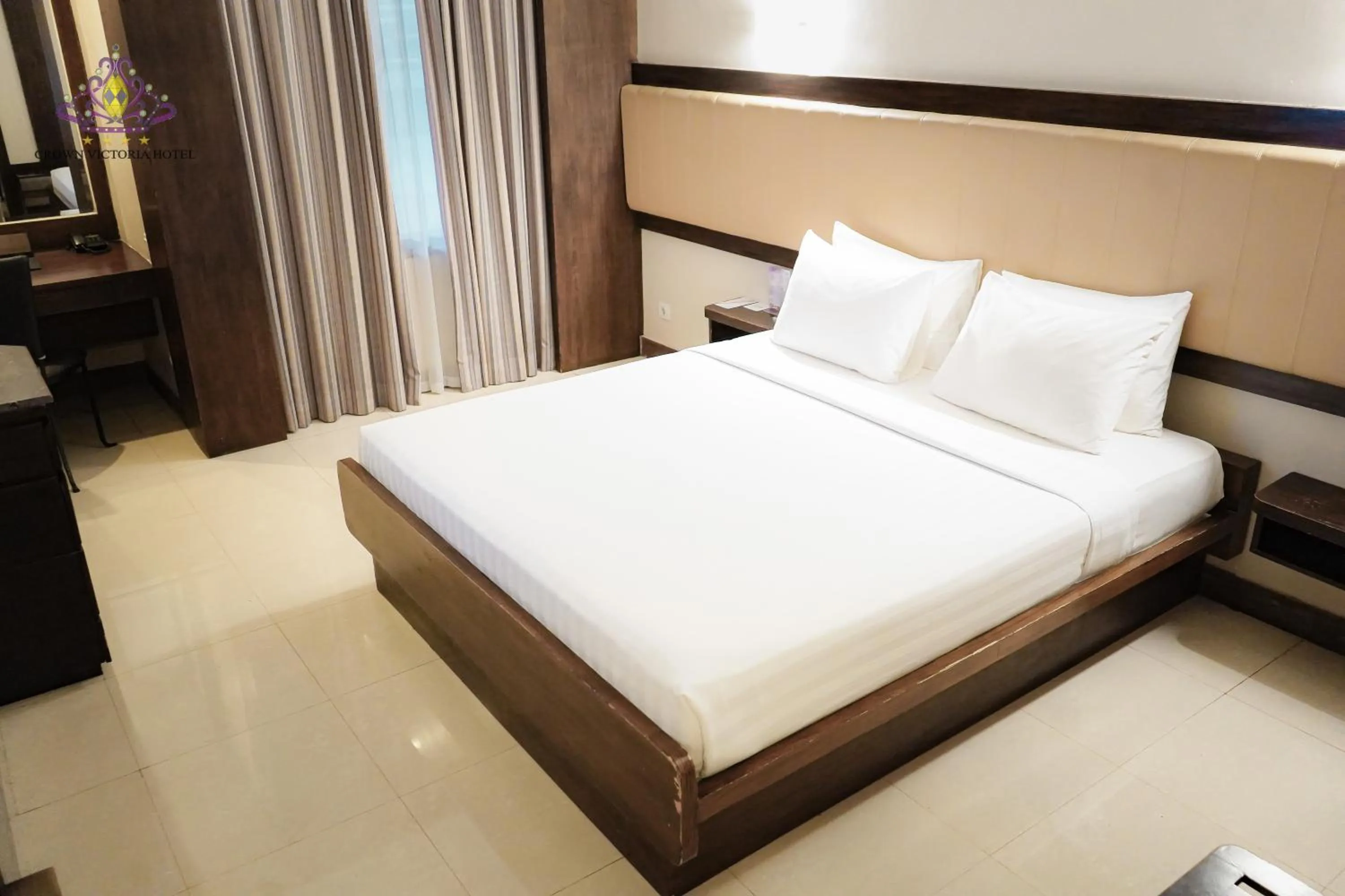 Bed in Crown Victoria Hotel Tulungagung