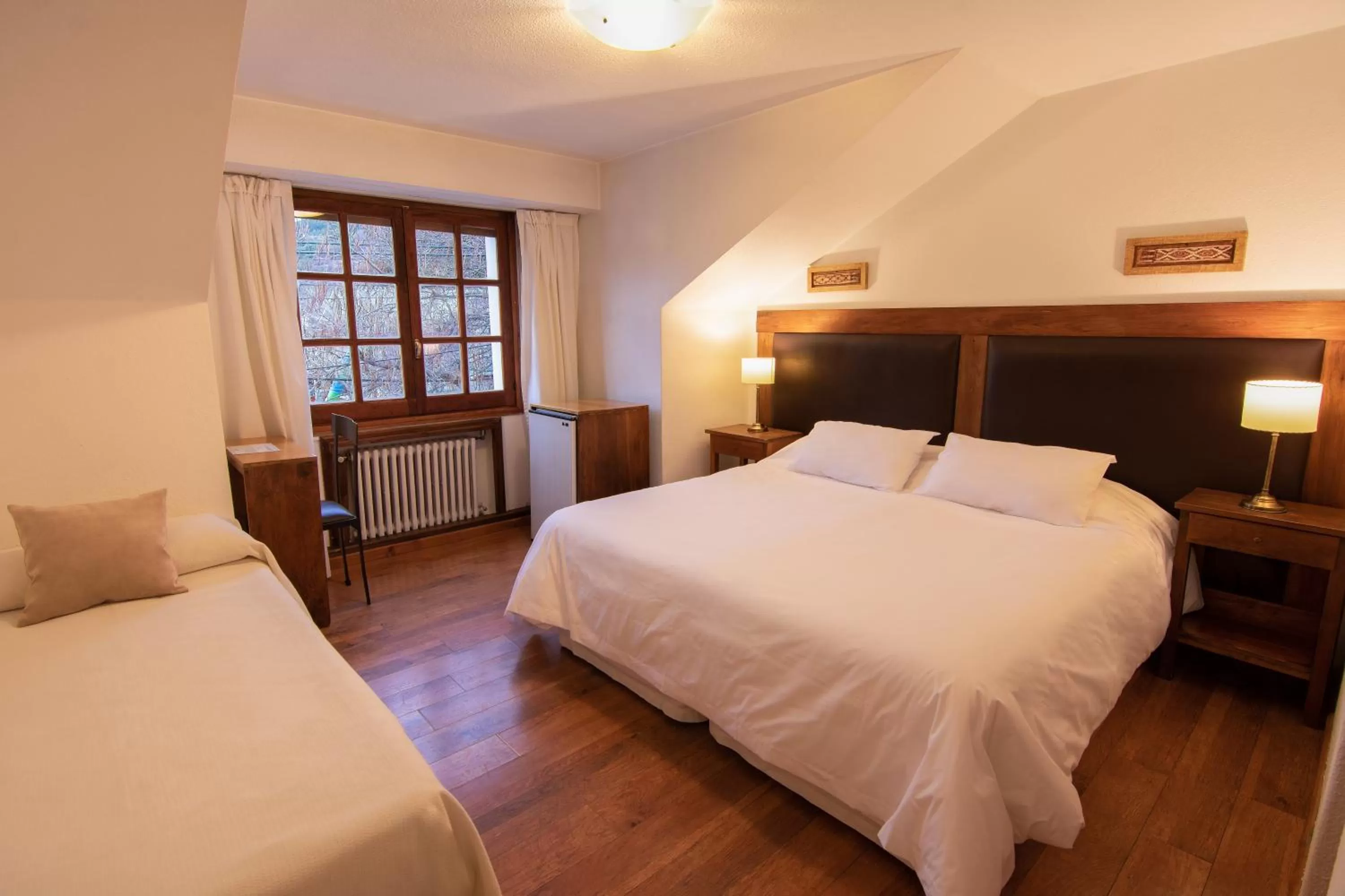 Bed in Hosteria Hostal del Esquiador