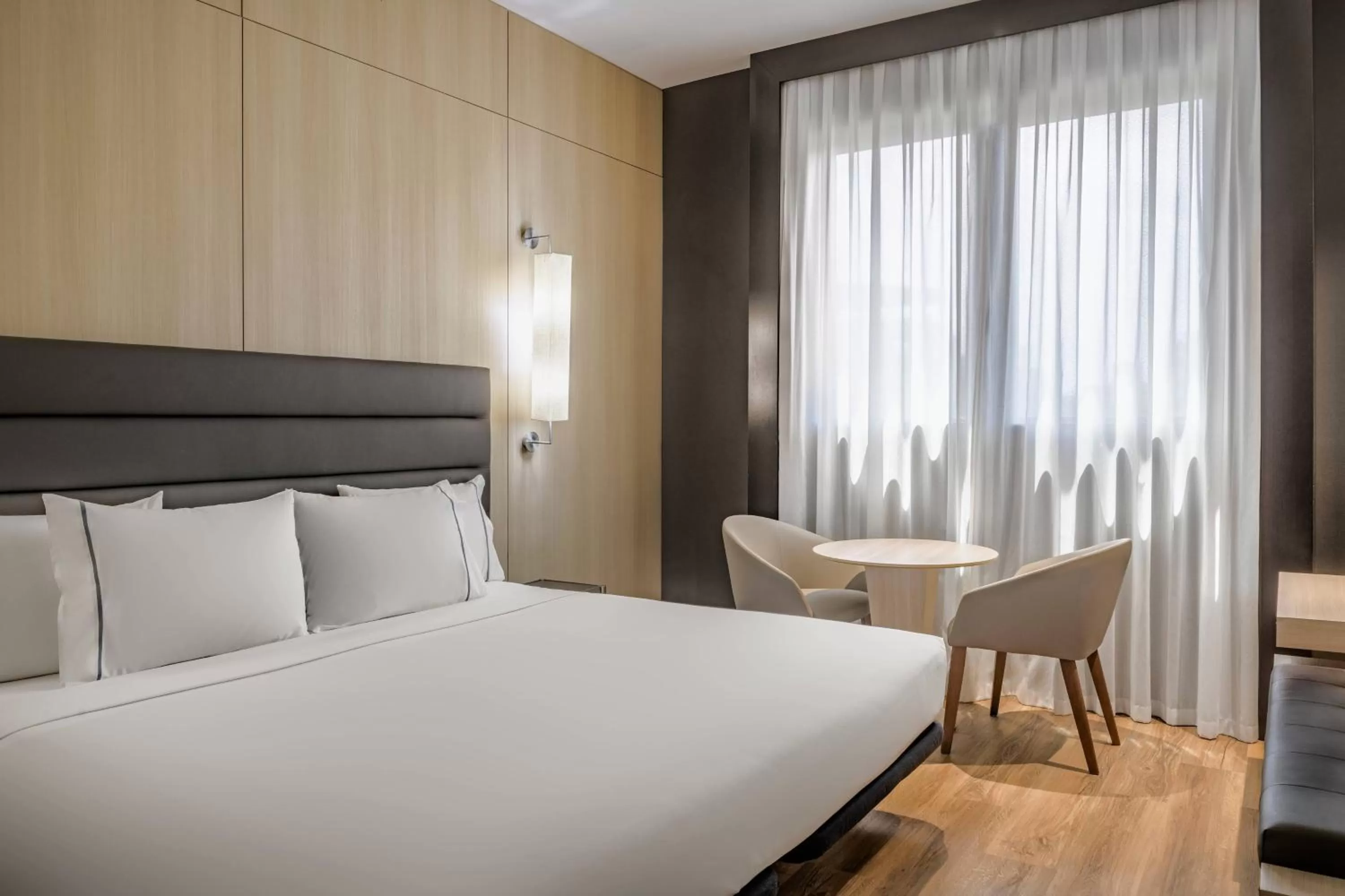 Photo of the whole room, Bed in AC Hotel Valencia by Marriott