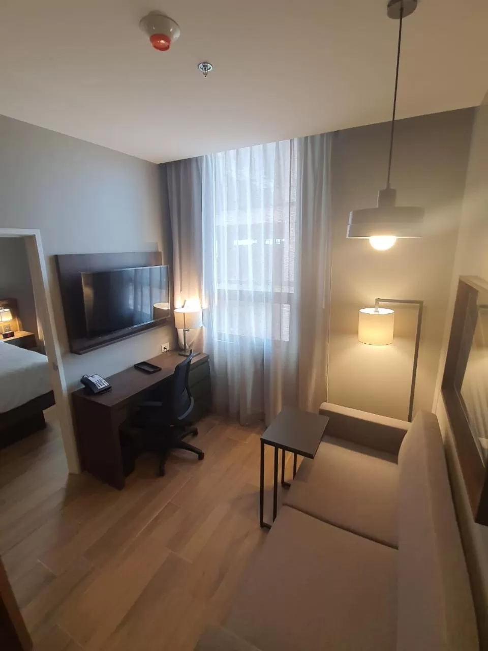 Living room, Bed in Staybridge Suites - Guadalajara Novena by IHG