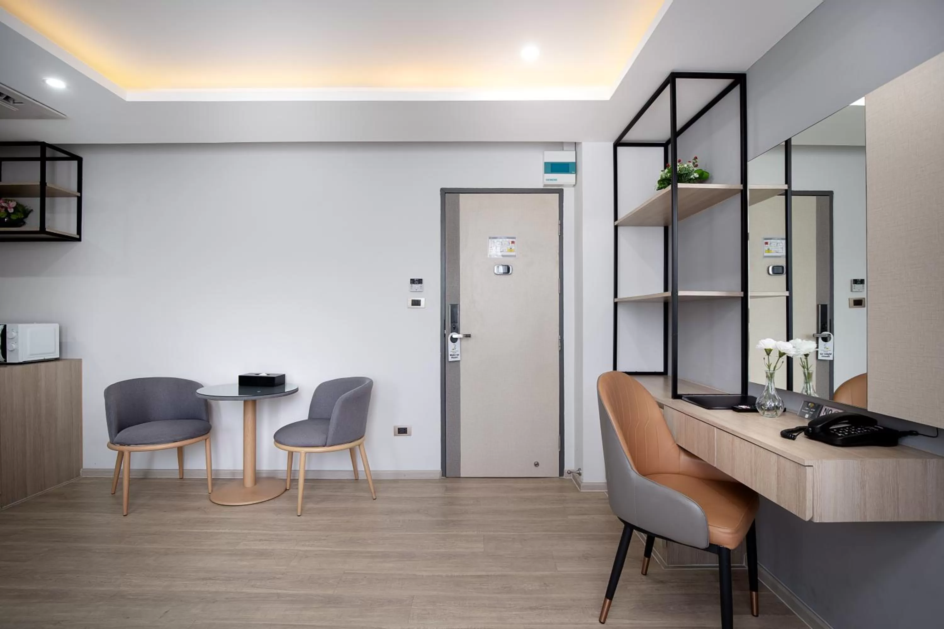 Living room in The Riski Hotel at Bangphlat Station SHA