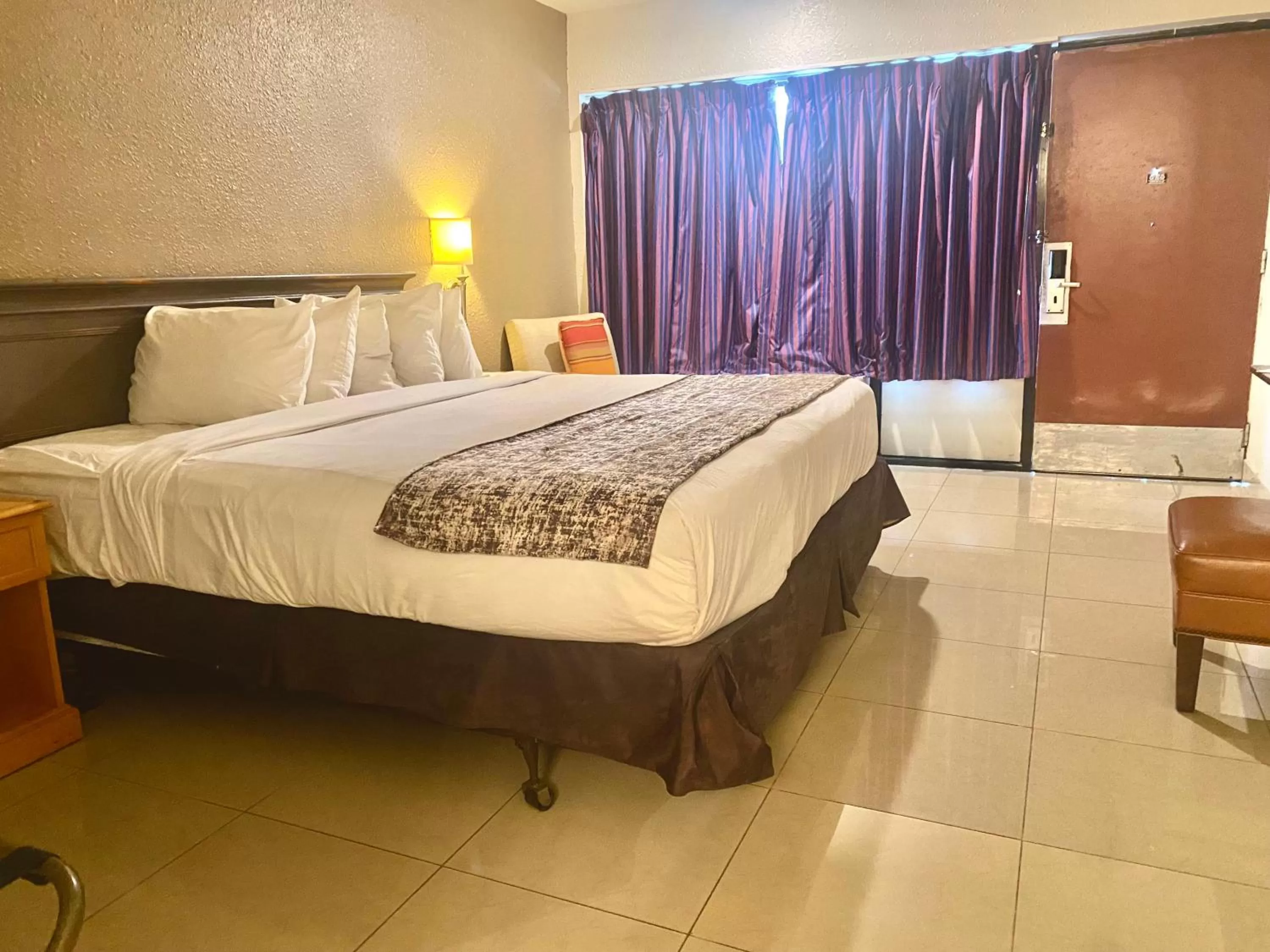 Bed in Garden Inn of Homestead