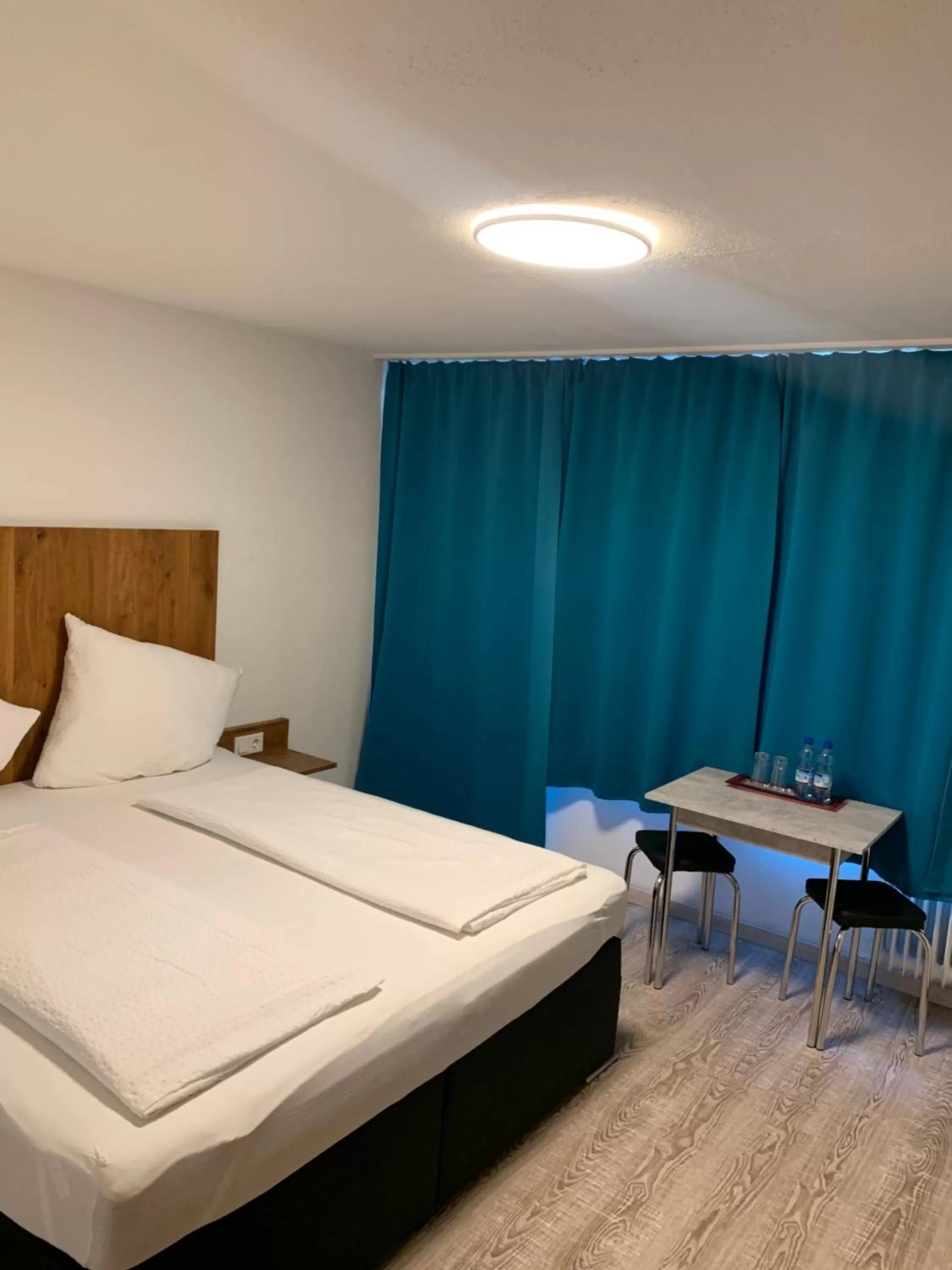 Bed in Smart Stay Rooms Feldkirch