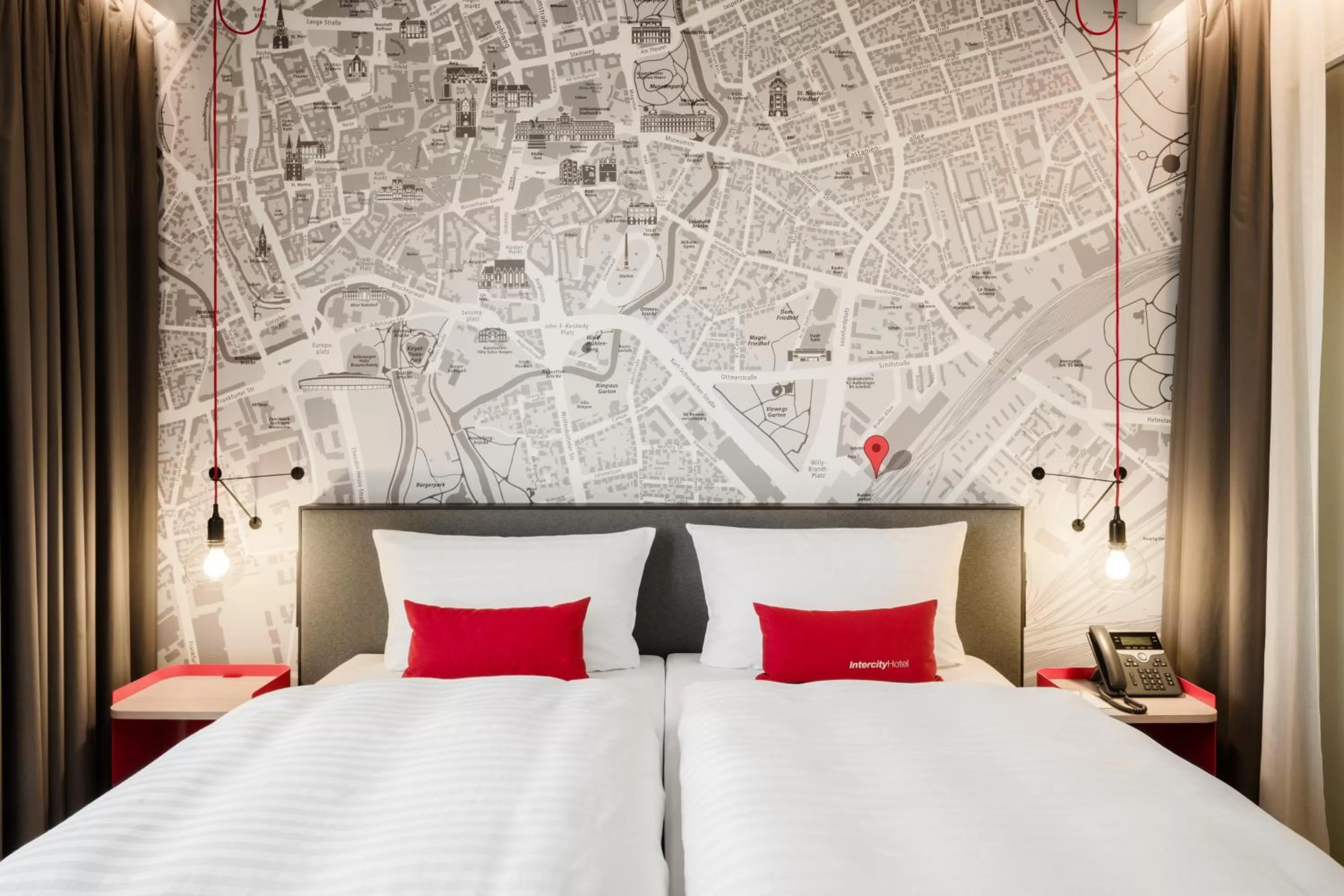 Photo of the whole room, Bed in IntercityHotel Braunschweig