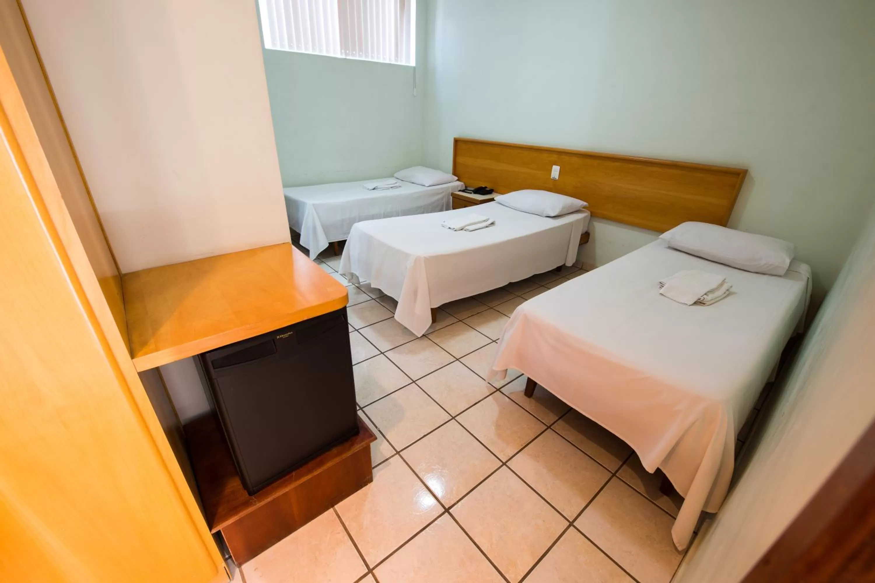 Bed in Hotel Metropolitano