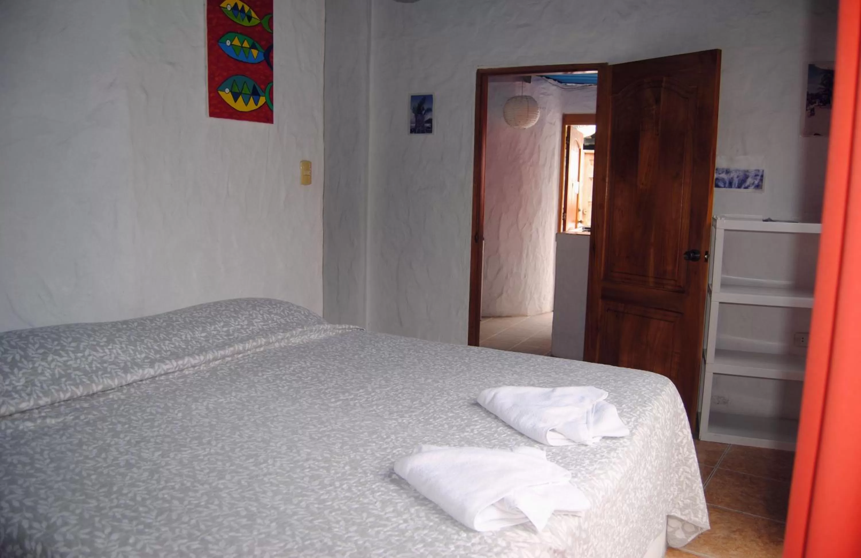 Bed in Hostal Galapagos by Bar de Beto