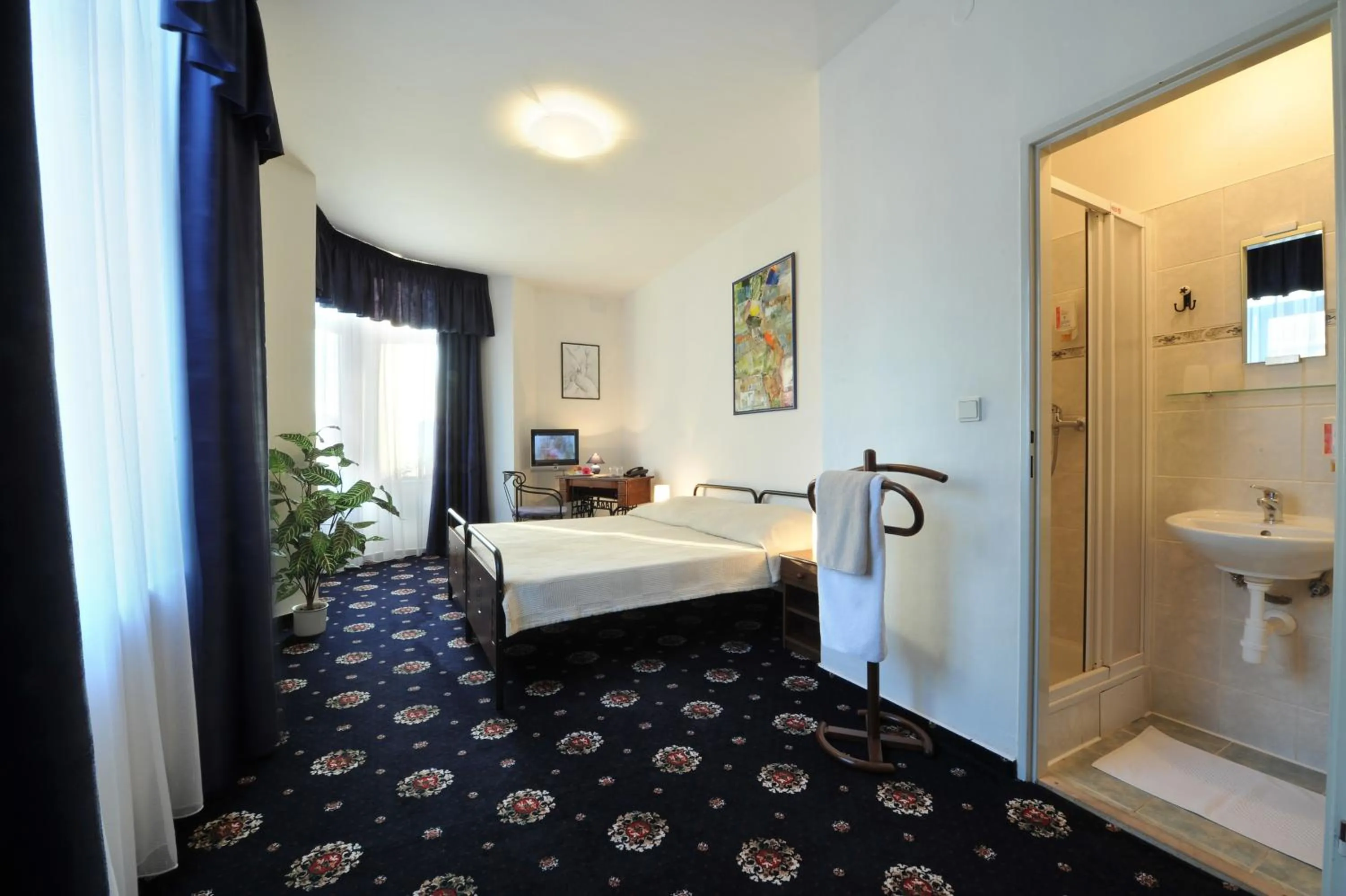 Photo of the whole room, Bed in Brioni Boutique Hotel 4*