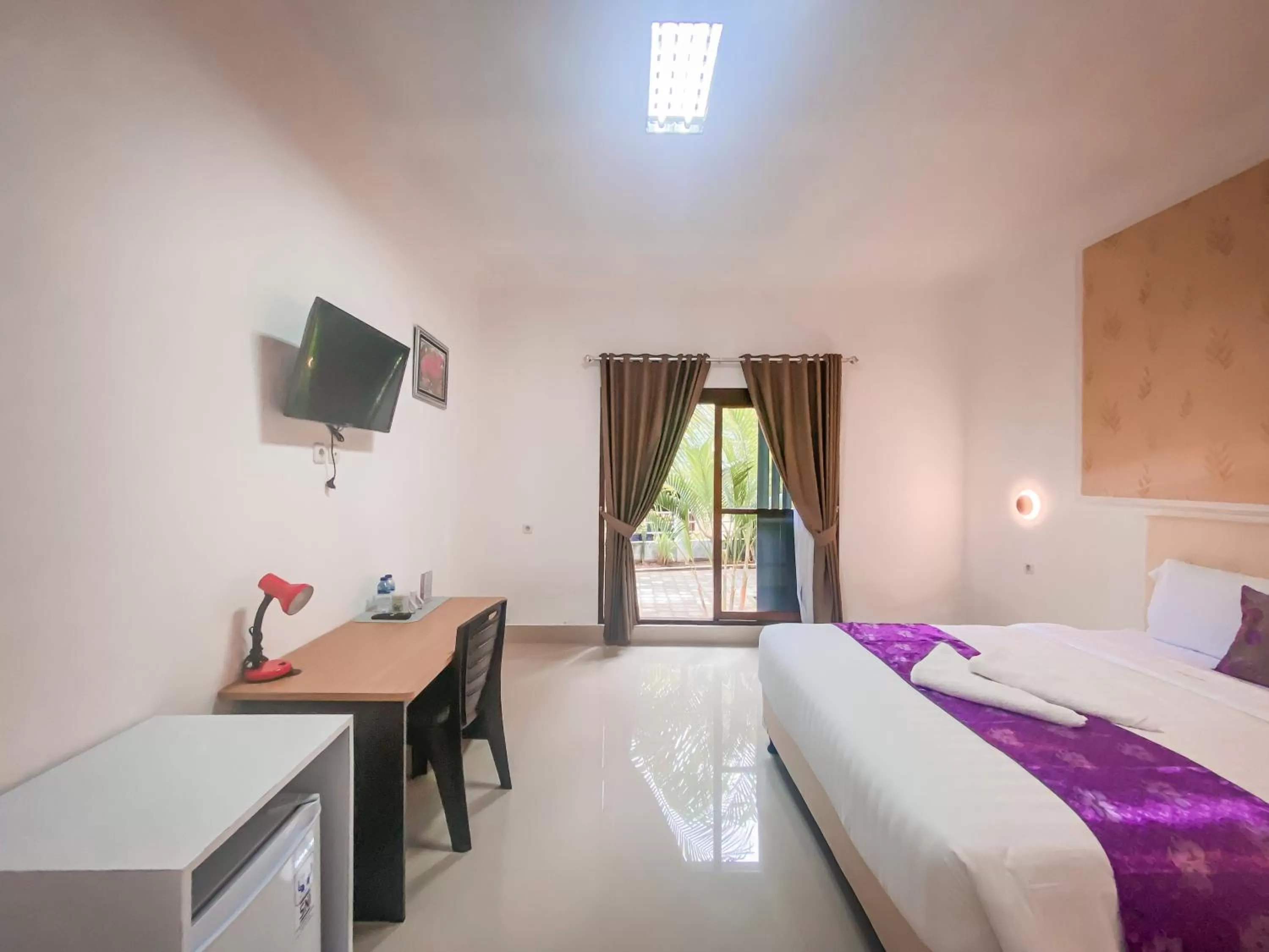 Photo of the whole room, Bed in Kesari Glory Nusa Penida by GenuineHost