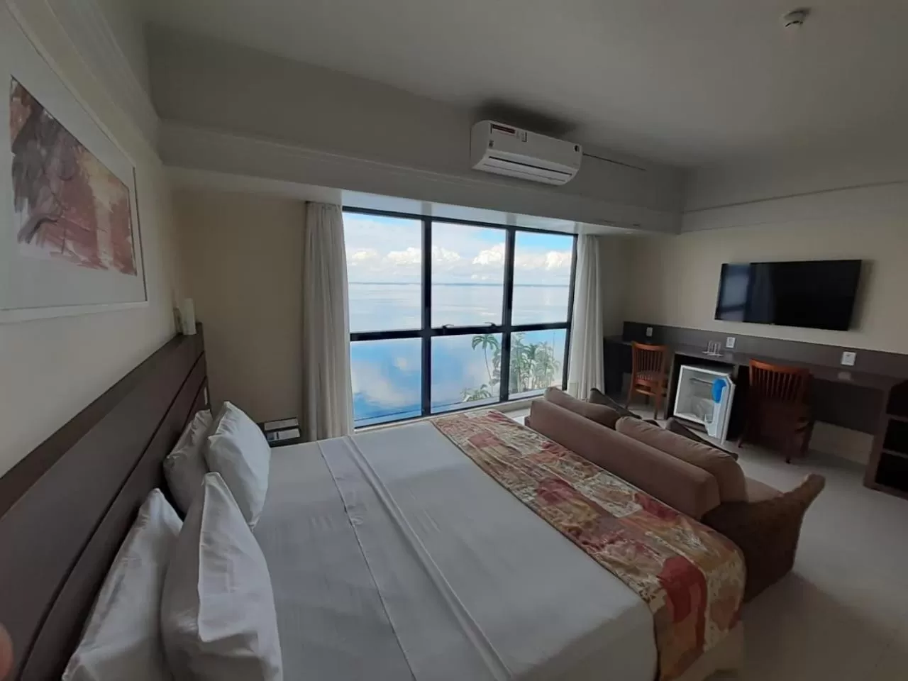 Bed in Tropical Executive Hotel