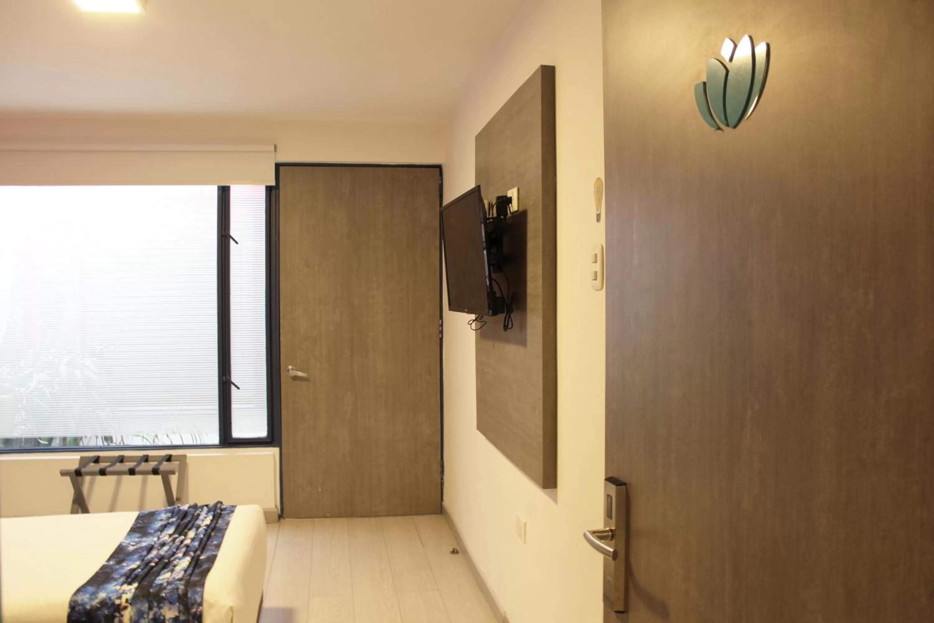 TV and multimedia, TV/Entertainment Center in Agora Suites Self-Service Boutique Hotel