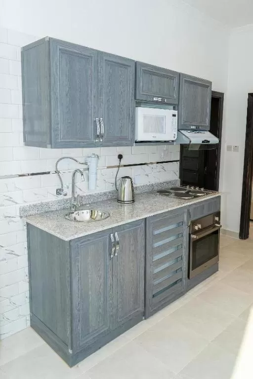 Kitchen/Kitchenette in Atlantis Suites Hotel