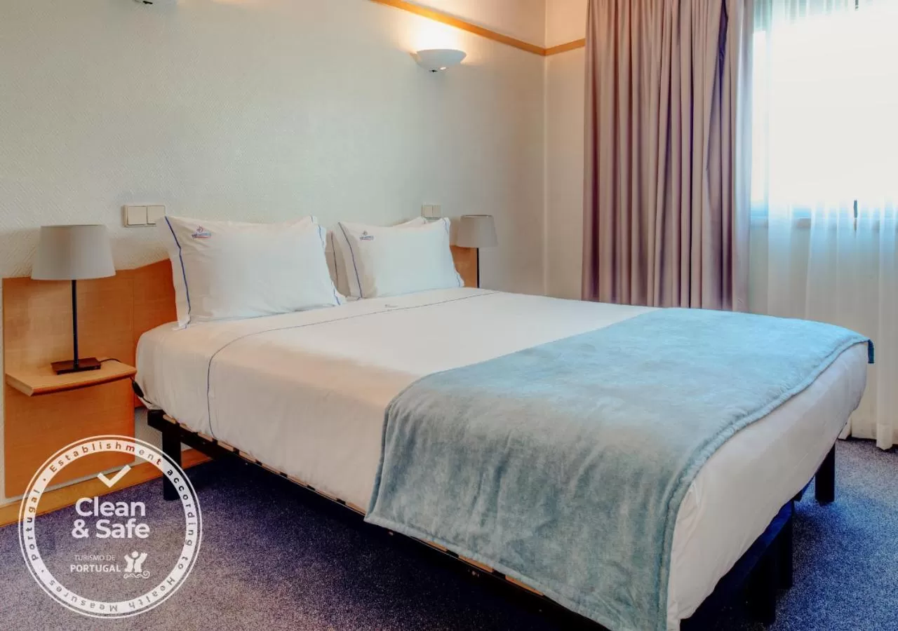 Bed in VIP Executive Eden Aparthotel