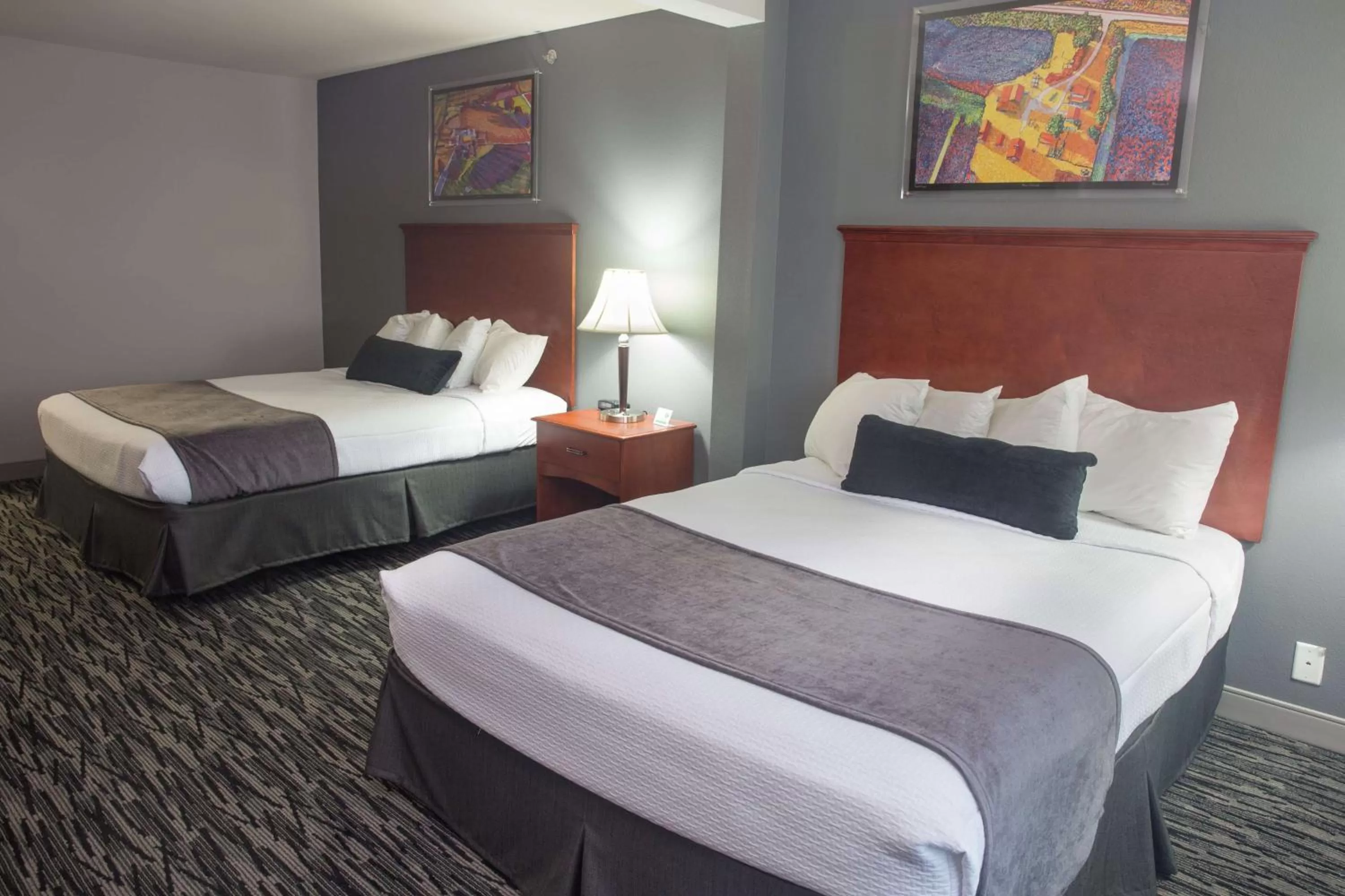 Bedroom, Bed in Parke Regency Hotel & Conf Ctr., BW Signature Collection