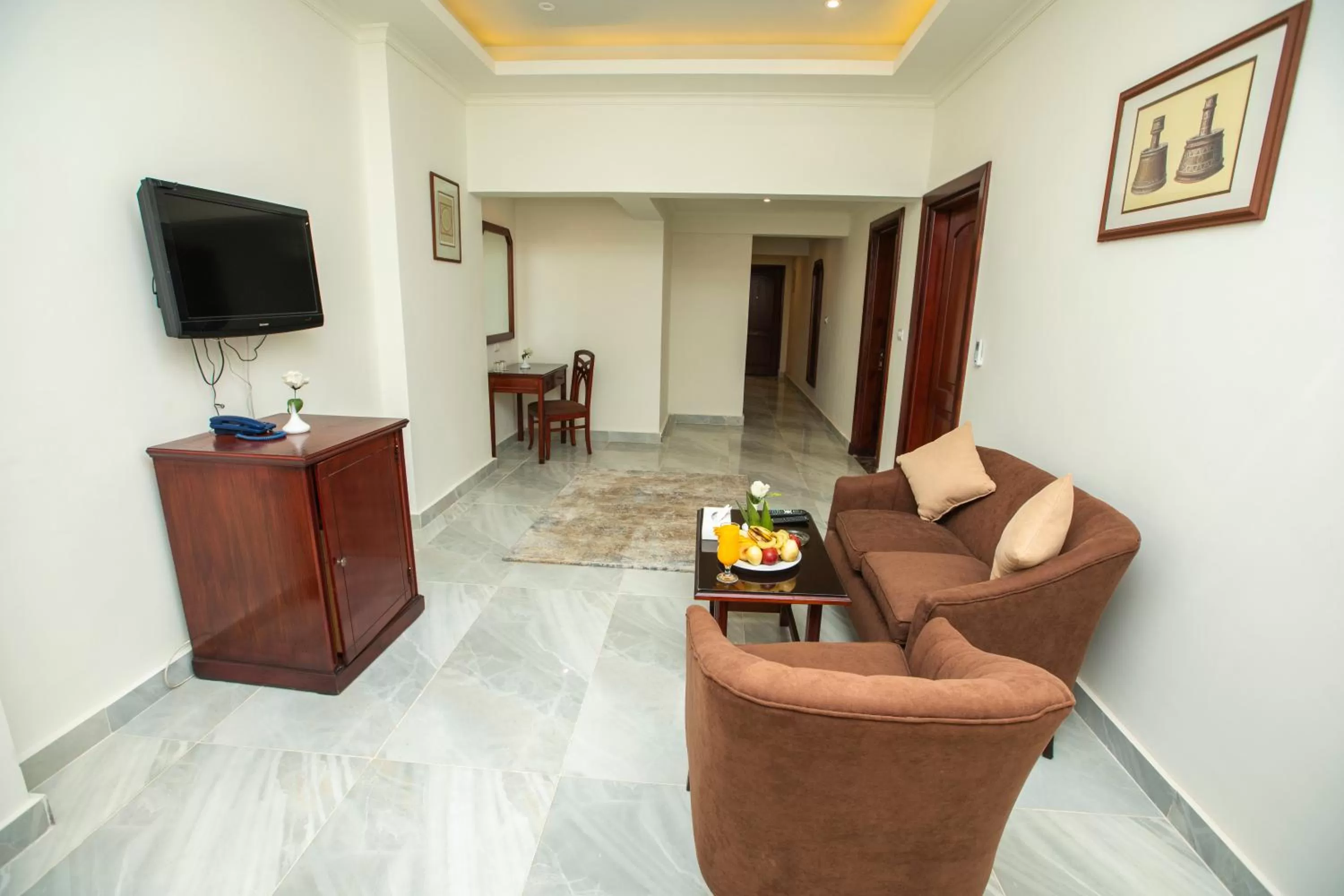 Communal lounge/ TV room in AIFU Hotel El Montazah Alexandria