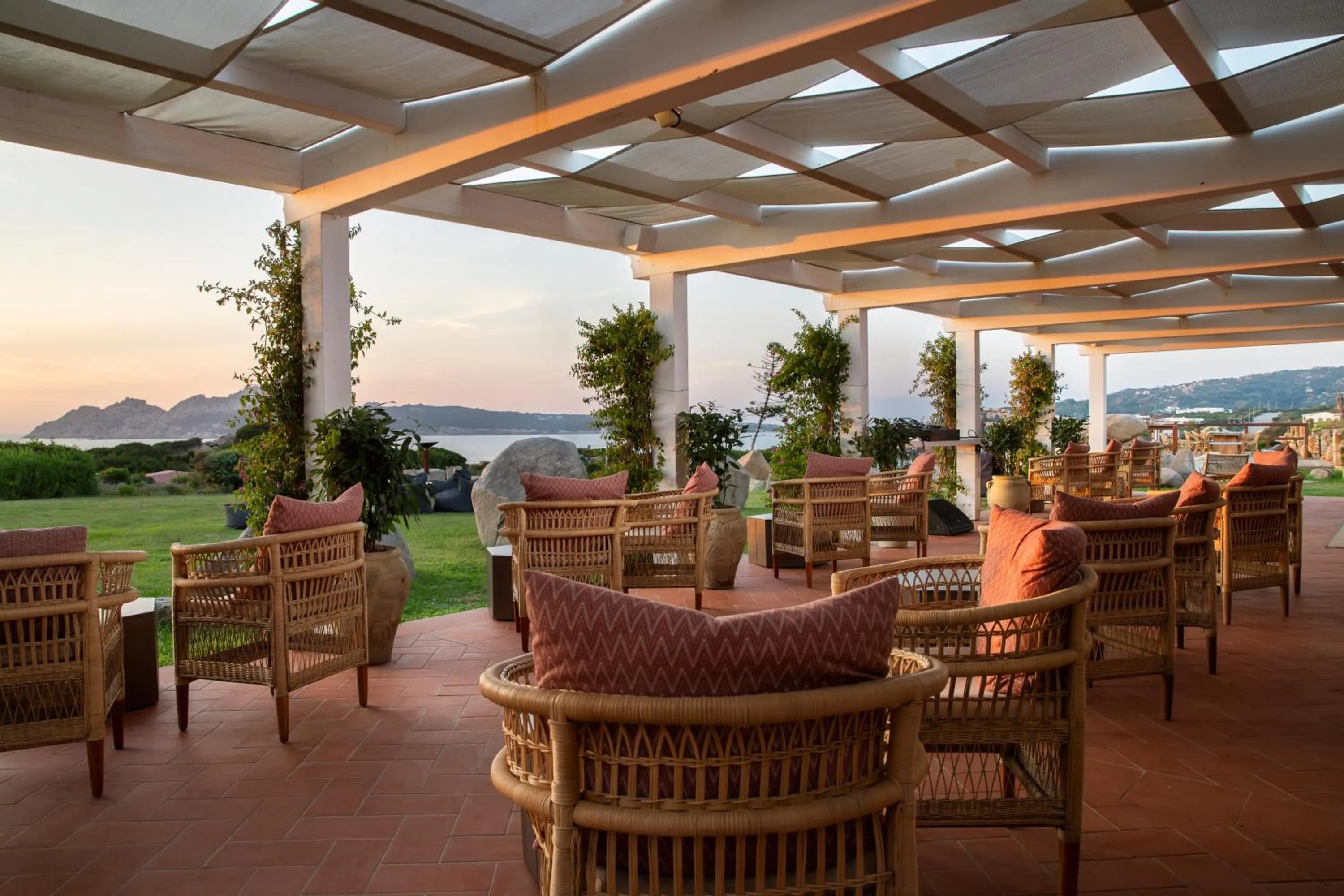 Lounge or bar in Mangia's Santa Teresa Sardinia, Curio Collection by Hilton